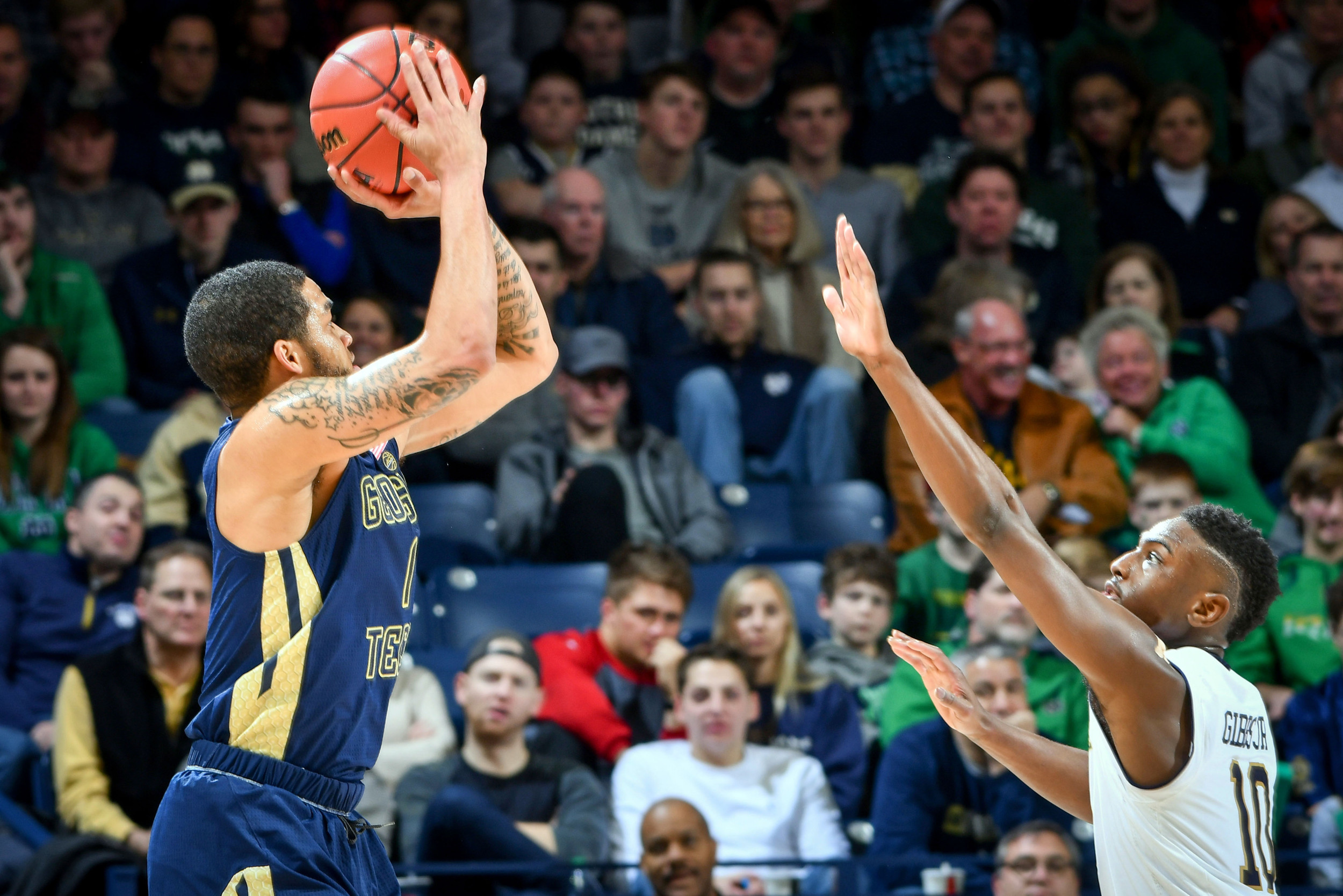 Dec 30, 2017; South Bend, IN, USA; Georgia Tech Yellow Jackets guard Tadric Jackson (1) shoots over Notre Dame Fighting Irish guard T.J. Gibbs (10) in the second half at the Purcell Pavilion. Mandatory Credit: Matt Cashore-USA TODAY Sports