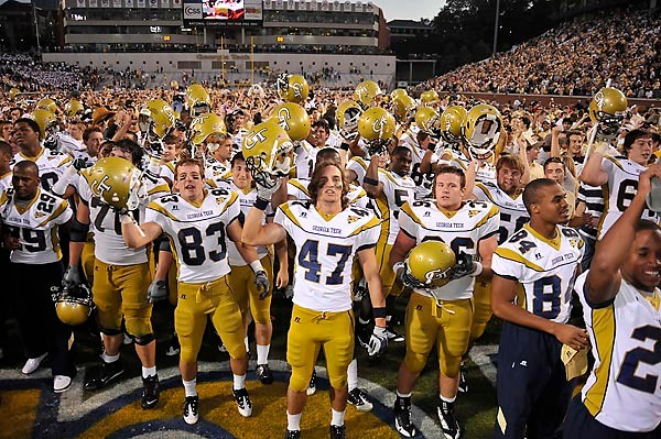 Tech players gather to sing and thank the fans following their victory against FSU. Photo by LensEffects