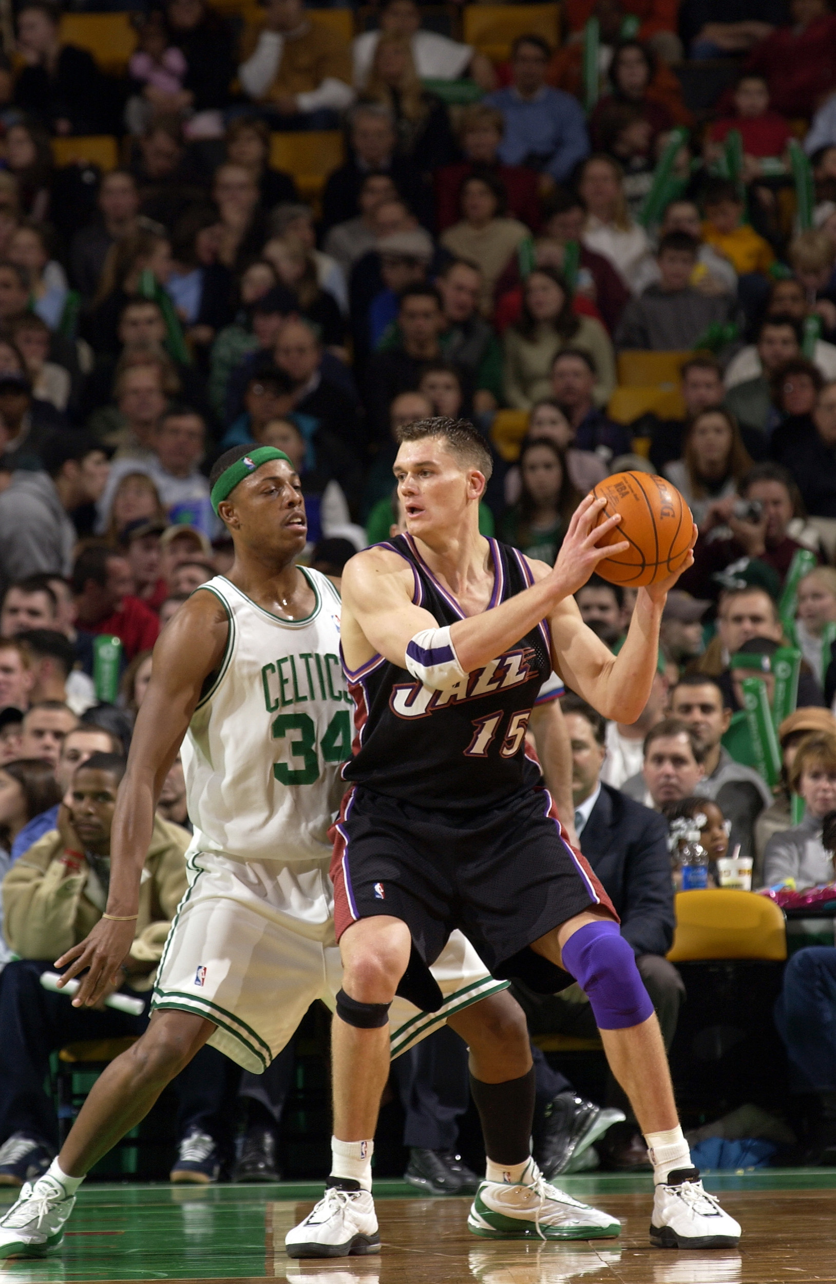 BOSTON - DECEMBER 19: Matt Harpring #15 of the Utah Jazz posts up against Paul Pierce #34 of the Boston Celtics December 19, 2003 at the Fleet Center in Boston, Massachusetts. NOTE TO USER: User expressly acknowledges that by downloading and or using this photograph, user is consenting to the terms and conditions of the Getty Images License agreement. (Photo by Brian Babineau/NBAE via Getty Images)