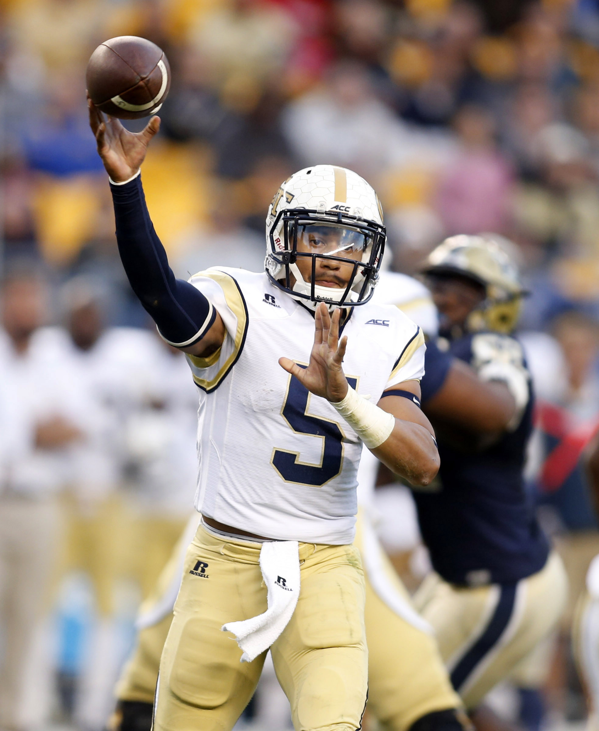 Oct 25, 2014; Pittsburgh, PA, USA; Yellow Jackets quarterback Justin Thomas (5) passes the ball during the third quarter. Charles LeClaire-USA TODAY Sports