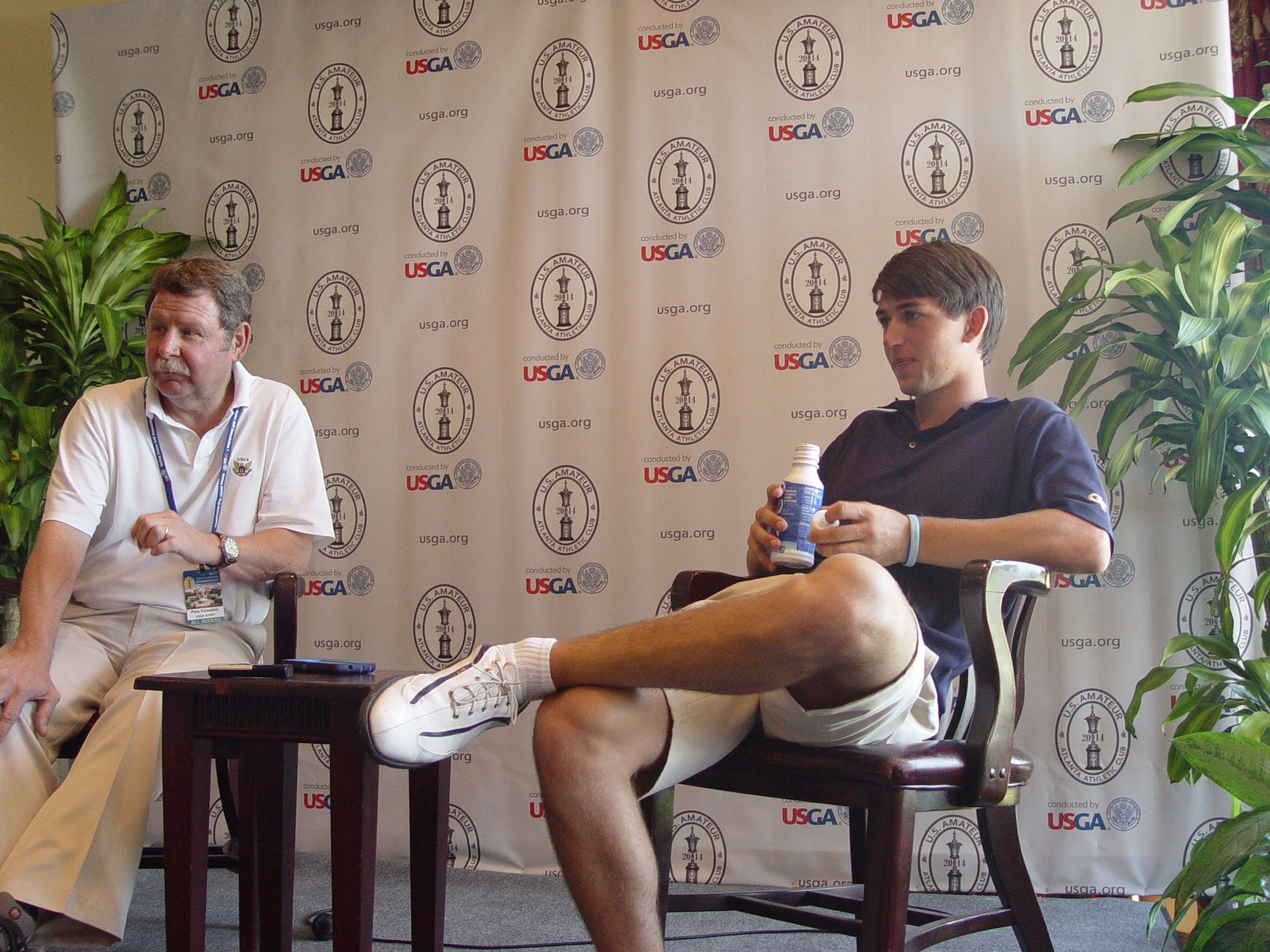 Ollie Schniederjans in the USGA media center following his 6 & 5 win in his opening round of match play at the U.S. Amateur, Highlands Course, Atlanta Athletic Club, August 14, 2014