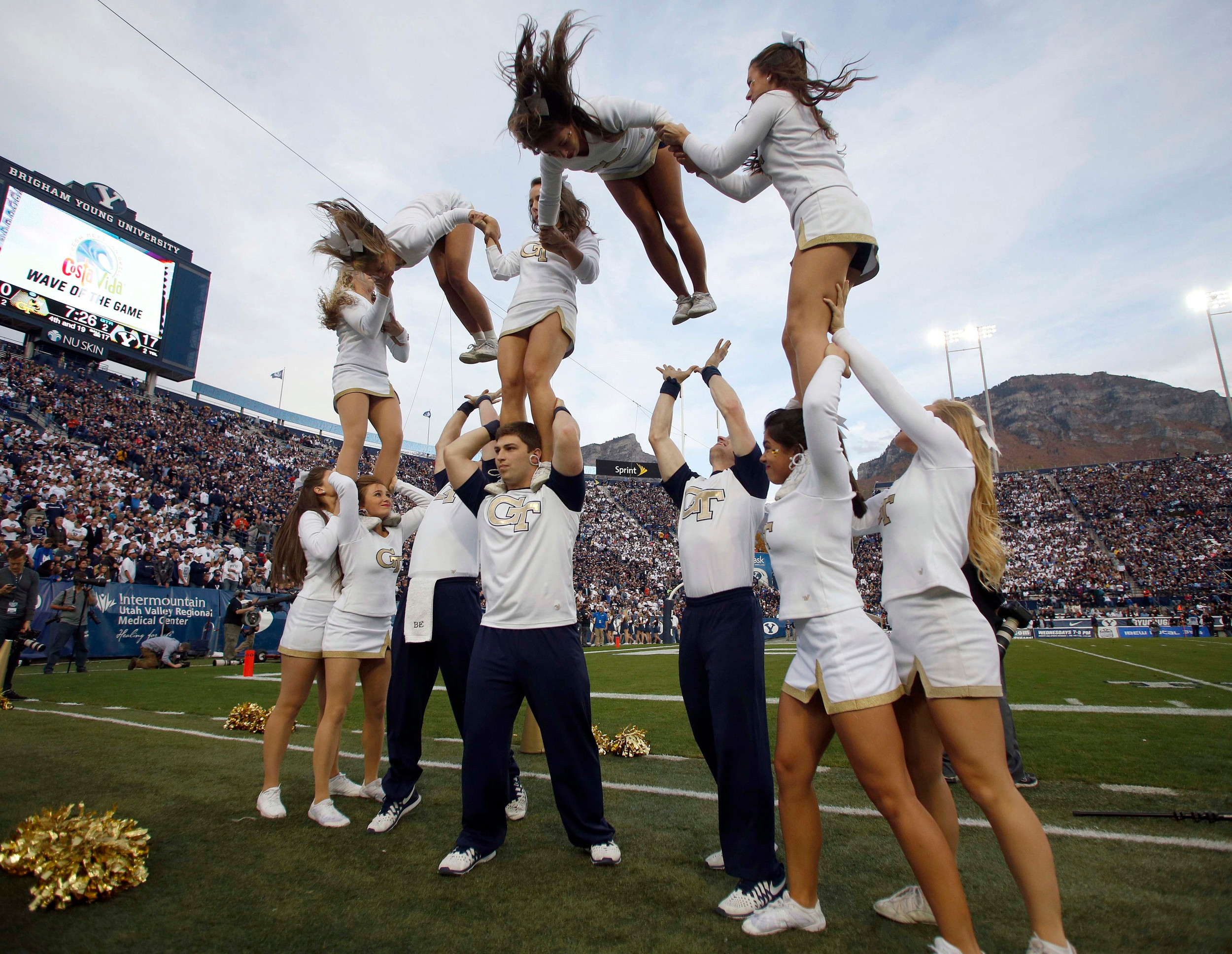 Georgia Tech Yellow Jackets cheerleaders perform during the second quarter of a football game against the Brigham Young Cougars at Lavell Edwards Stadium. (Jim Urquhart-USA TODAY Sports)