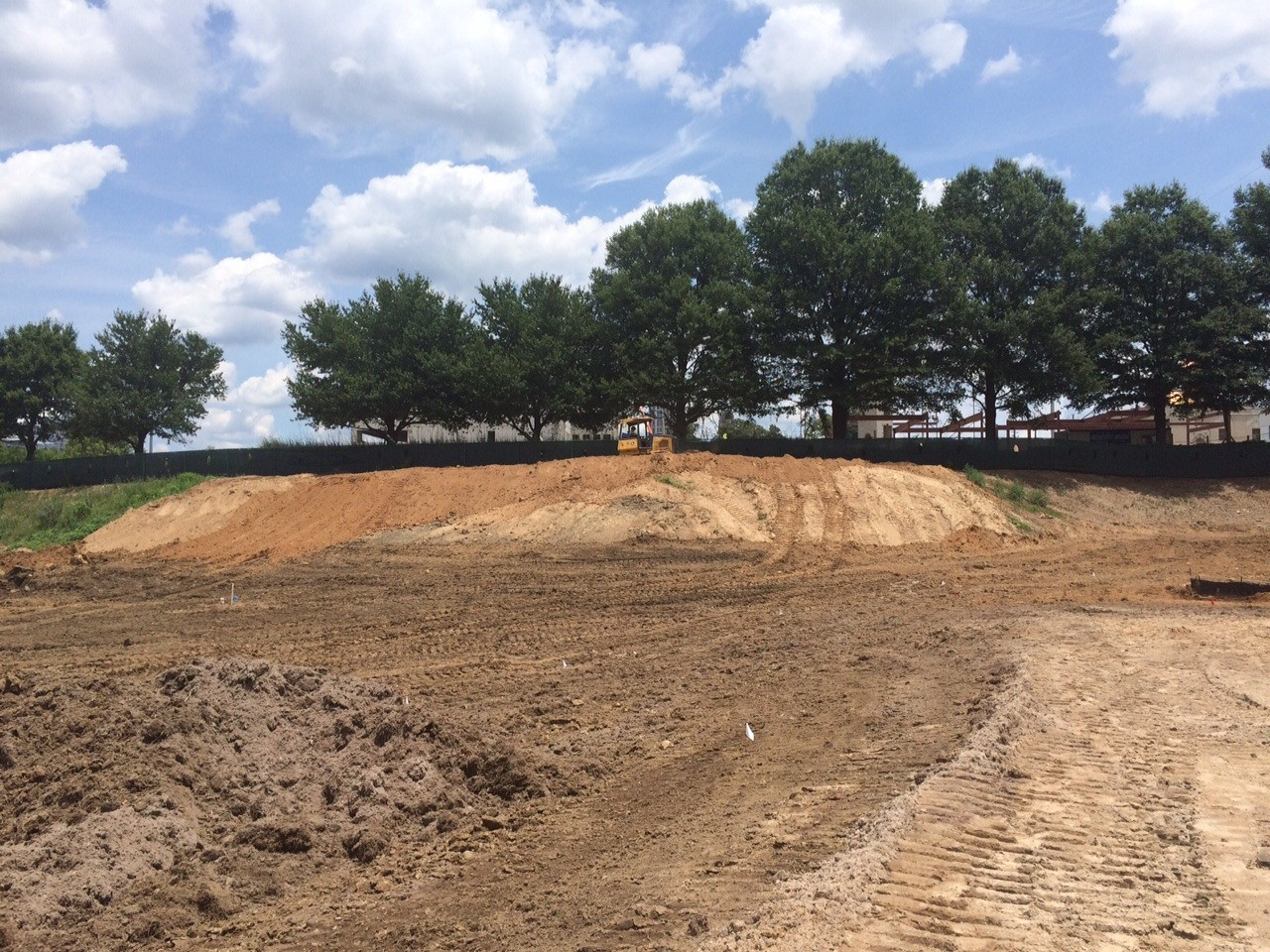 Ground-level shots of construction at the Georgia Tech's Noonan Golf Facility along 16th and Mecaslin Streets