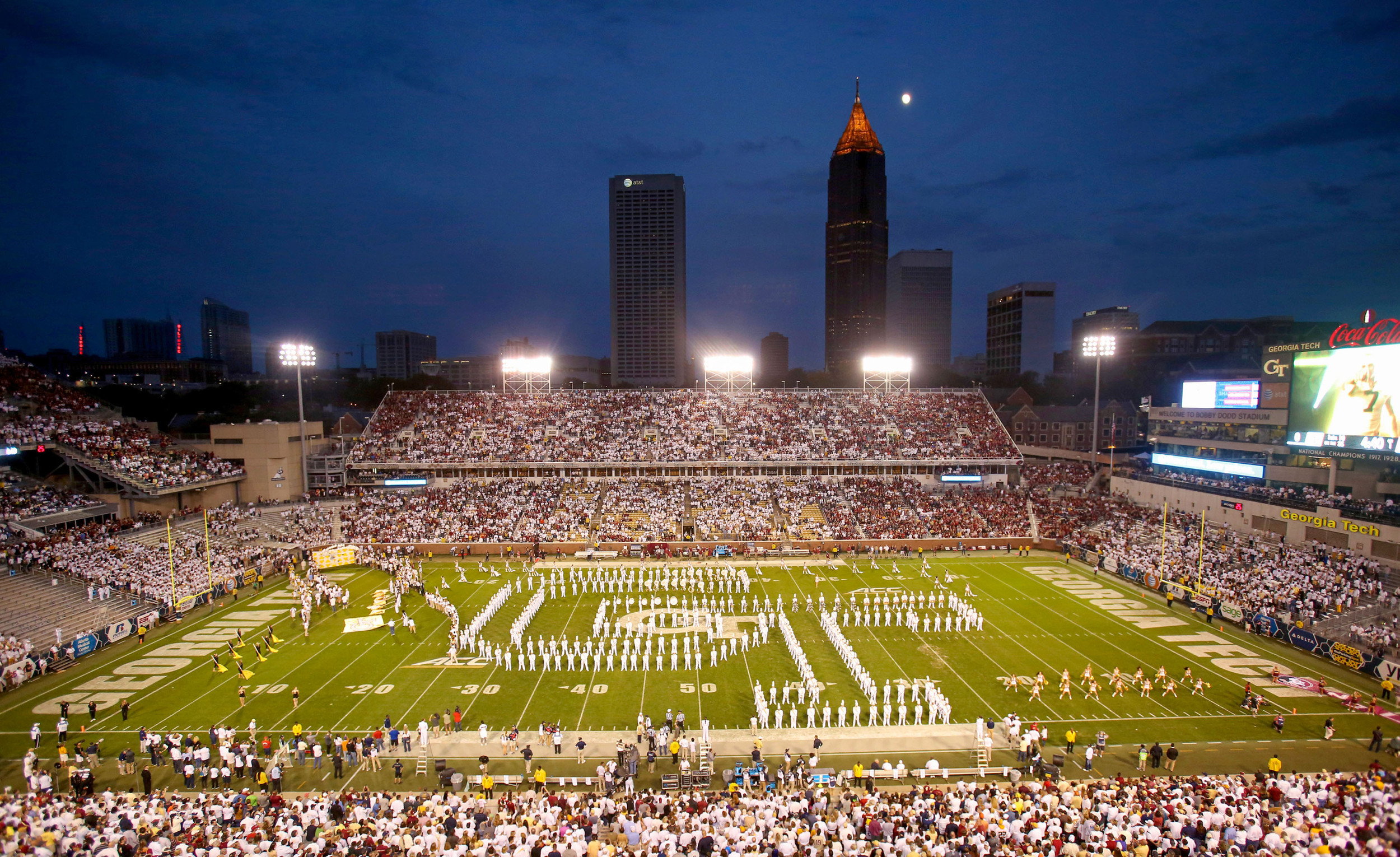 The Atlanta skyline is shown as the Georgia Tech Yellow Jackets marching band perform before their game against the Florida State Seminoles at Bobby Dodd Stadium. Credit: Jason Getz-USA TODAY Sports