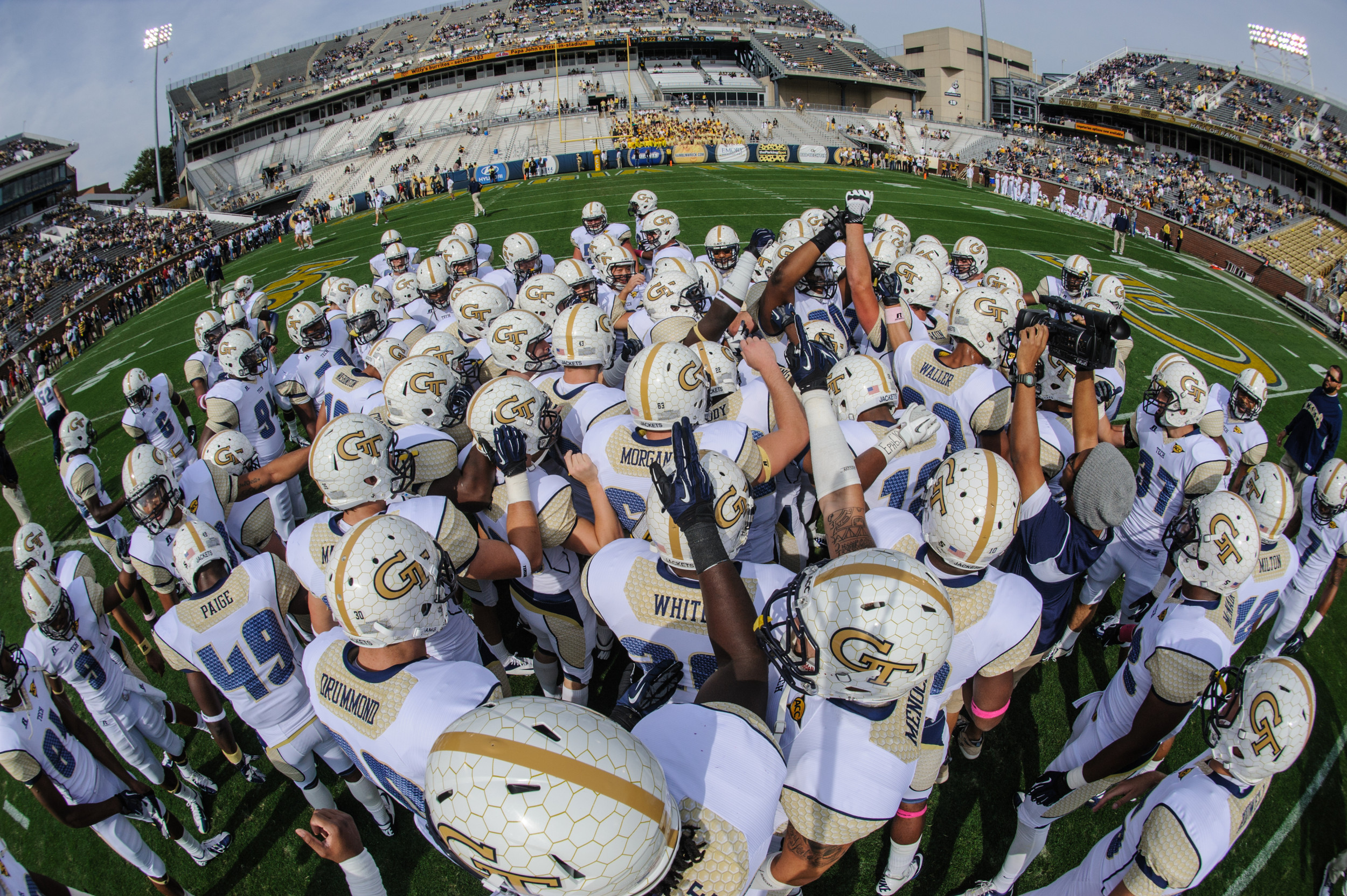 The Yellow Jackets huddle after warm-ups.