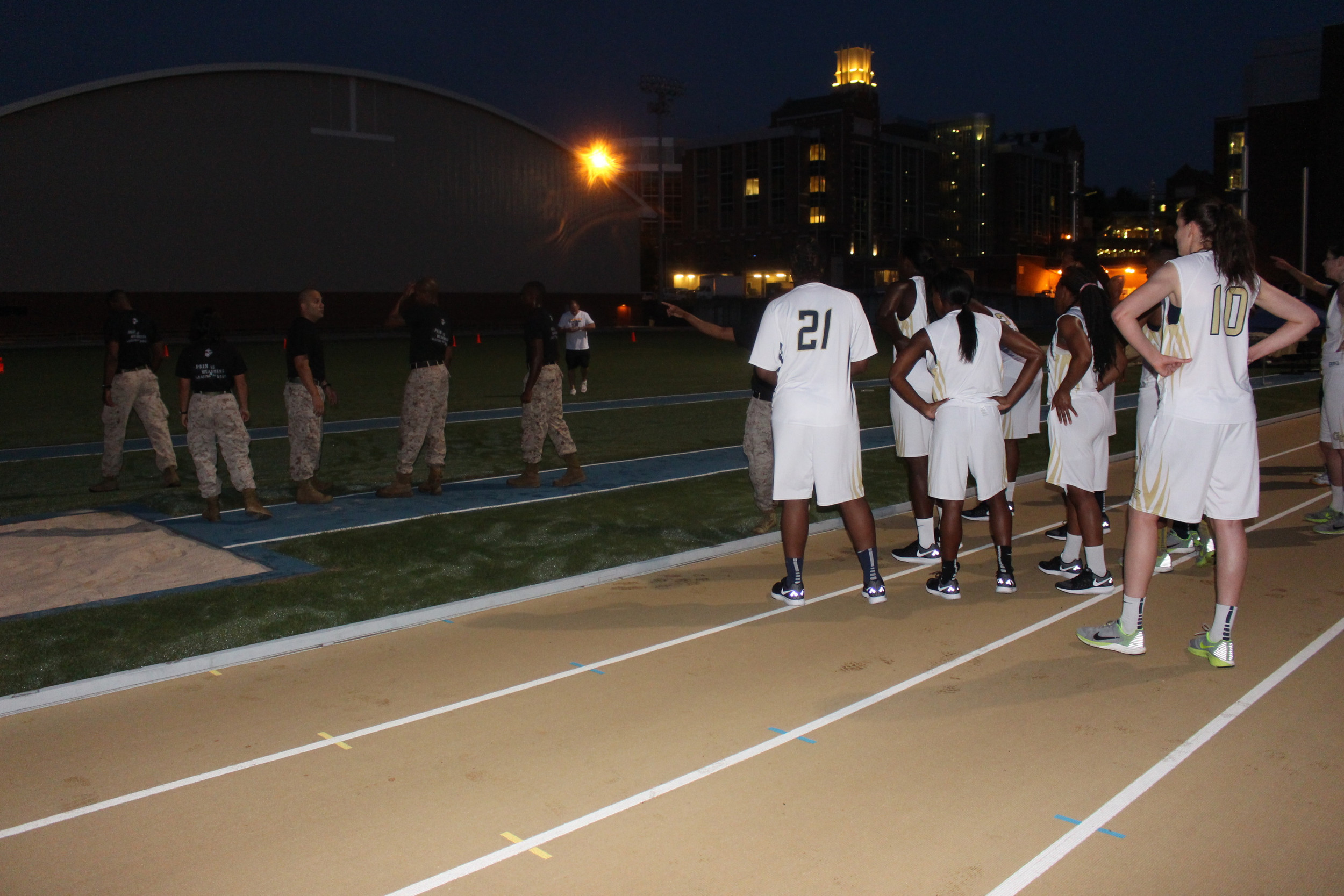The Marines give instructions to the Yellow Jackets.