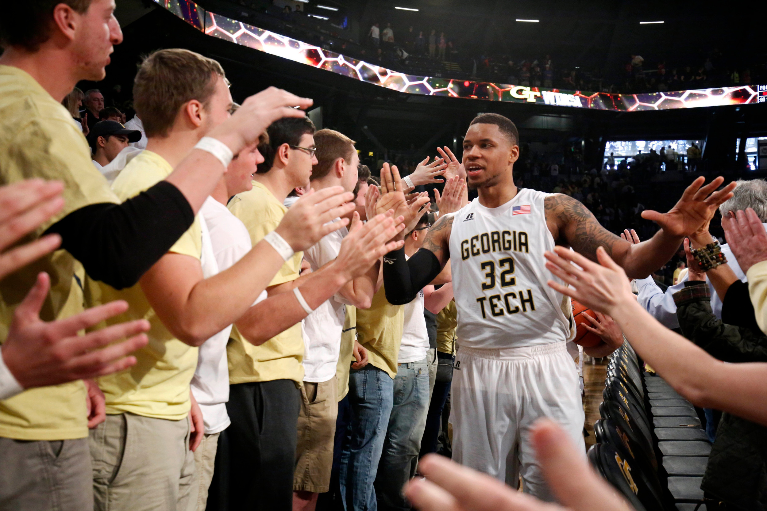 Mar 5, 2016; Atlanta, GA, USA; Georgia Tech Yellow Jackets forward Nick Jacobs (32) celebrate their win against the Pittsburgh Panthers at McCamish Pavilion. Credit: Jason Getz-USA TODAY Sports