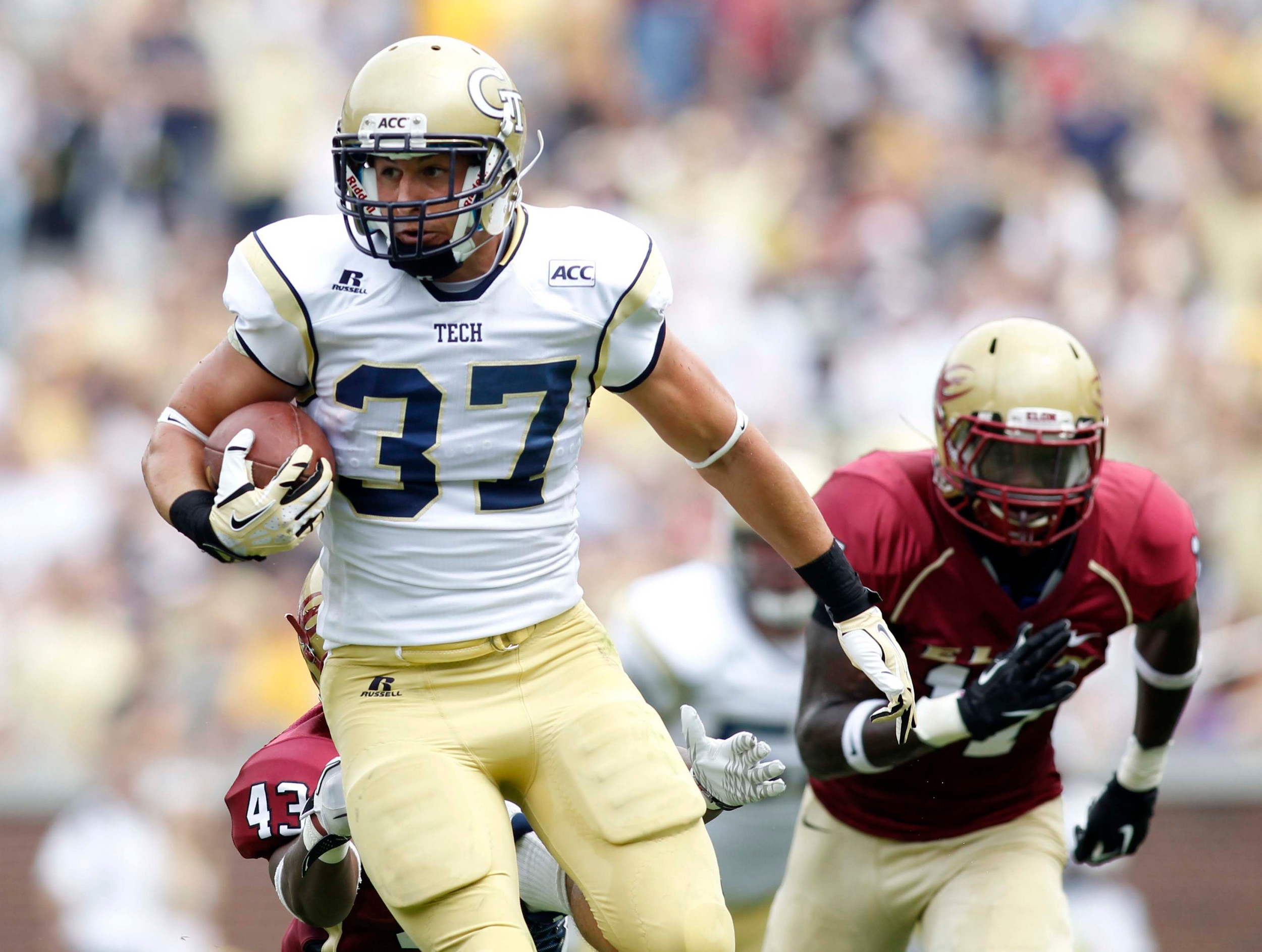Aug 31, 2013; Atlanta, GA, USA; Georgia Tech Yellow Jackets running back Zach Laskey (37) runs the ball for a touchdown against the Elon Phoenix in the first quarter at Bobby Dodd Stadium. Mandatory Credit: Brett Davis-USA TODAY Sports