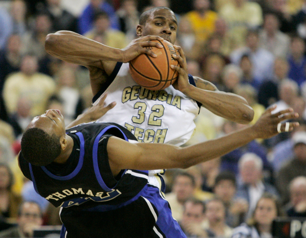 Georgia Tech forward Jeremis Smith (32) knocks Duke forward Lance Thomas backward during the second half of their basketball game, Wednesday, Jan. 10, 2007, in Atlanta. Georgia Tech won 74-63. (AP Photo/John Amis)