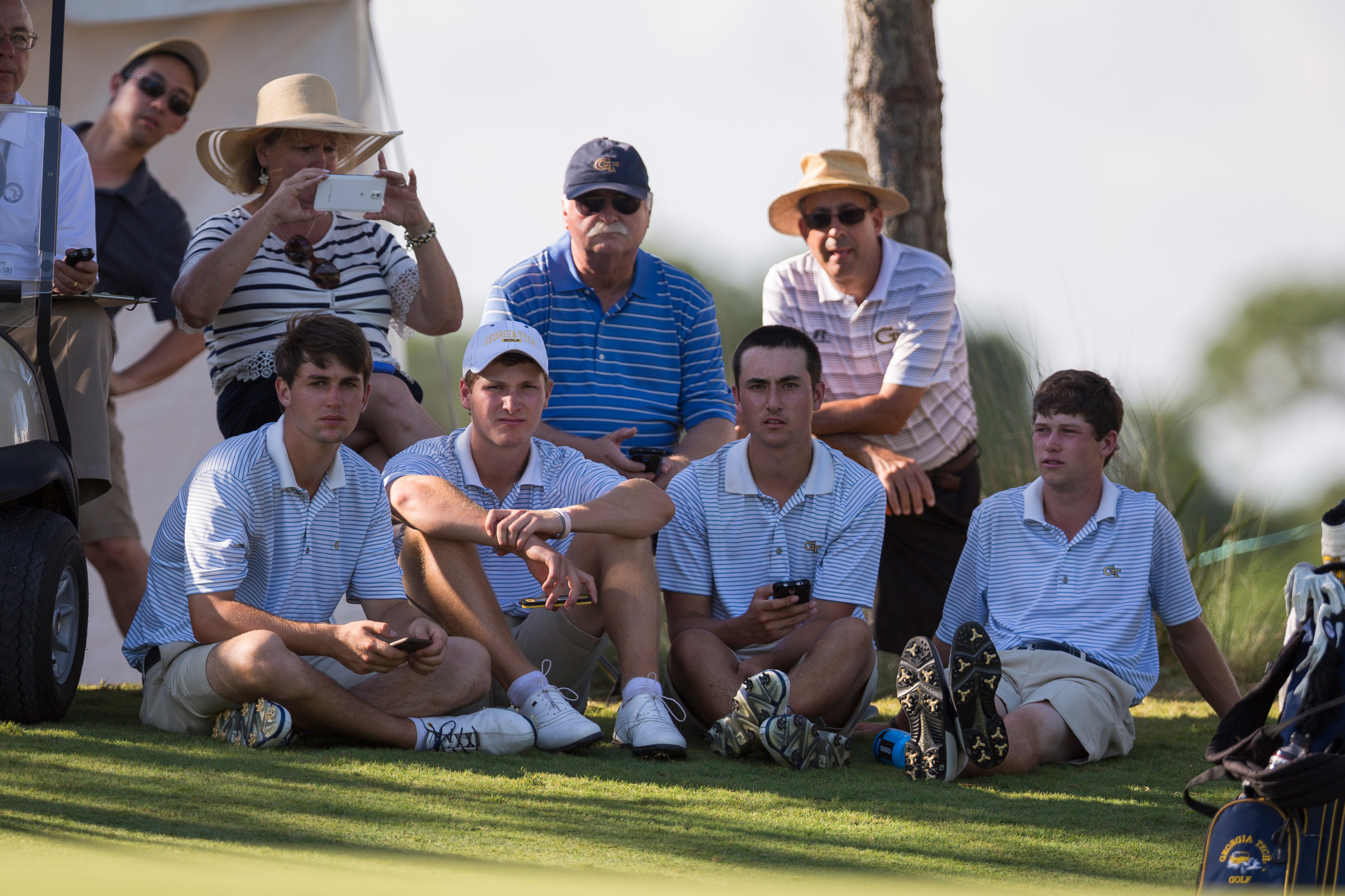 Georgia Tech's golf team - from left, Ollie Schniederjans, Vincent Whaley, Chris Petefish, James Clark - and other watch Anders Albertson finishing on the last hole of the third round of the NCAA Golf Championship, May 31, 2015, The Concession Golf Club, Bradenton, Fla.