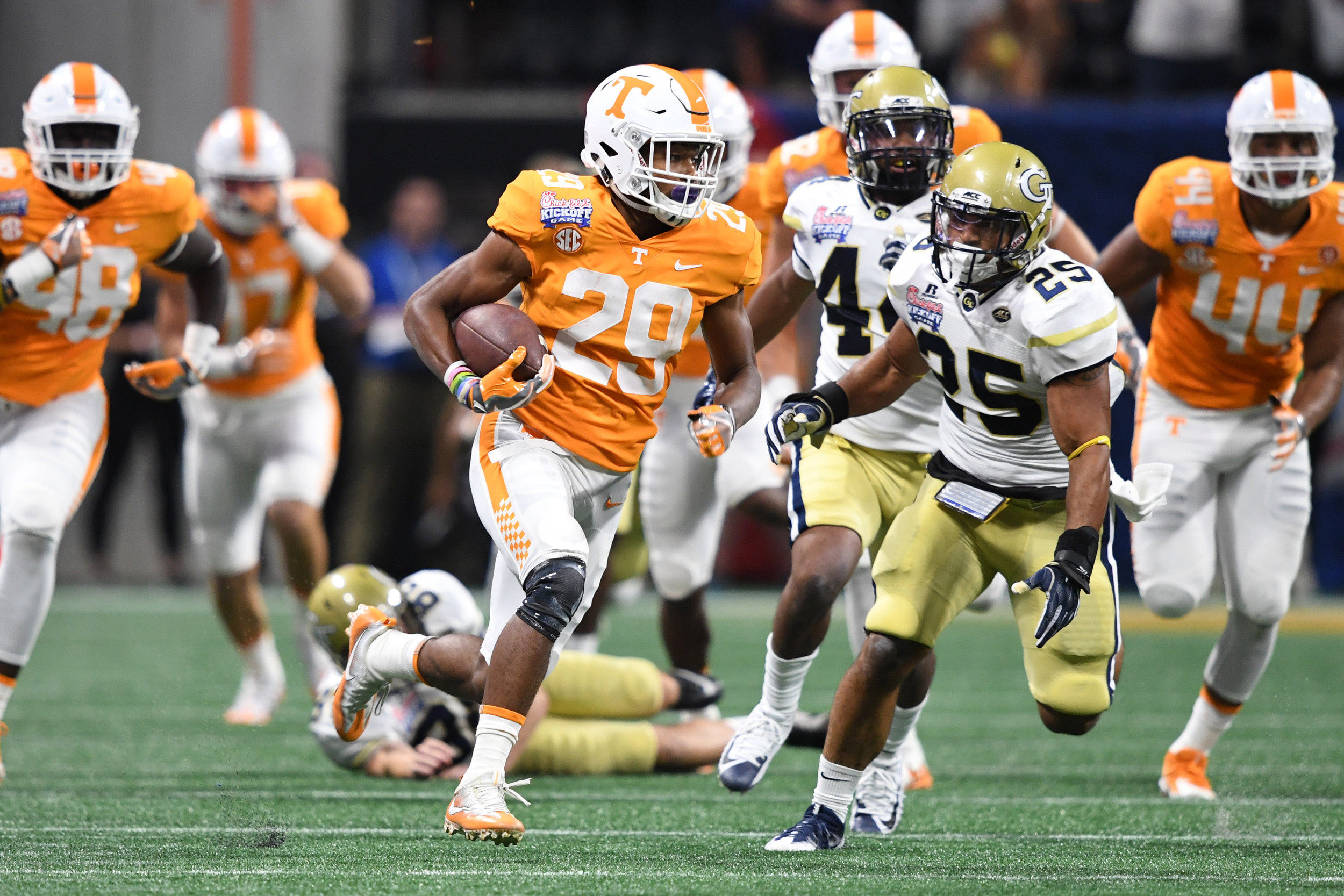 Sep 4, 2017; Atlanta, GA, USA; Tennessee Volunteers defensive back Evan Berry (29) returns a kickoff against Georgia Tech Yellow Jackets linebacker Tre' Jackson (25) during the first quarter at Mercedes-Benz Stadium. Mandatory Credit: John David Mercer-USA TODAY Sports