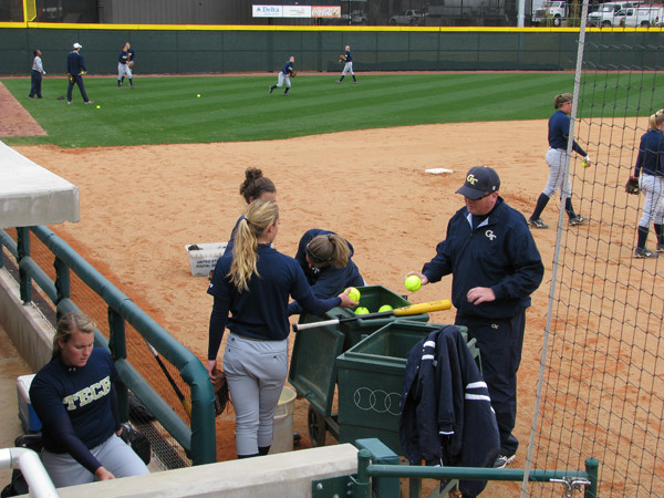 Softball team practices in its new stadium for the first time.
