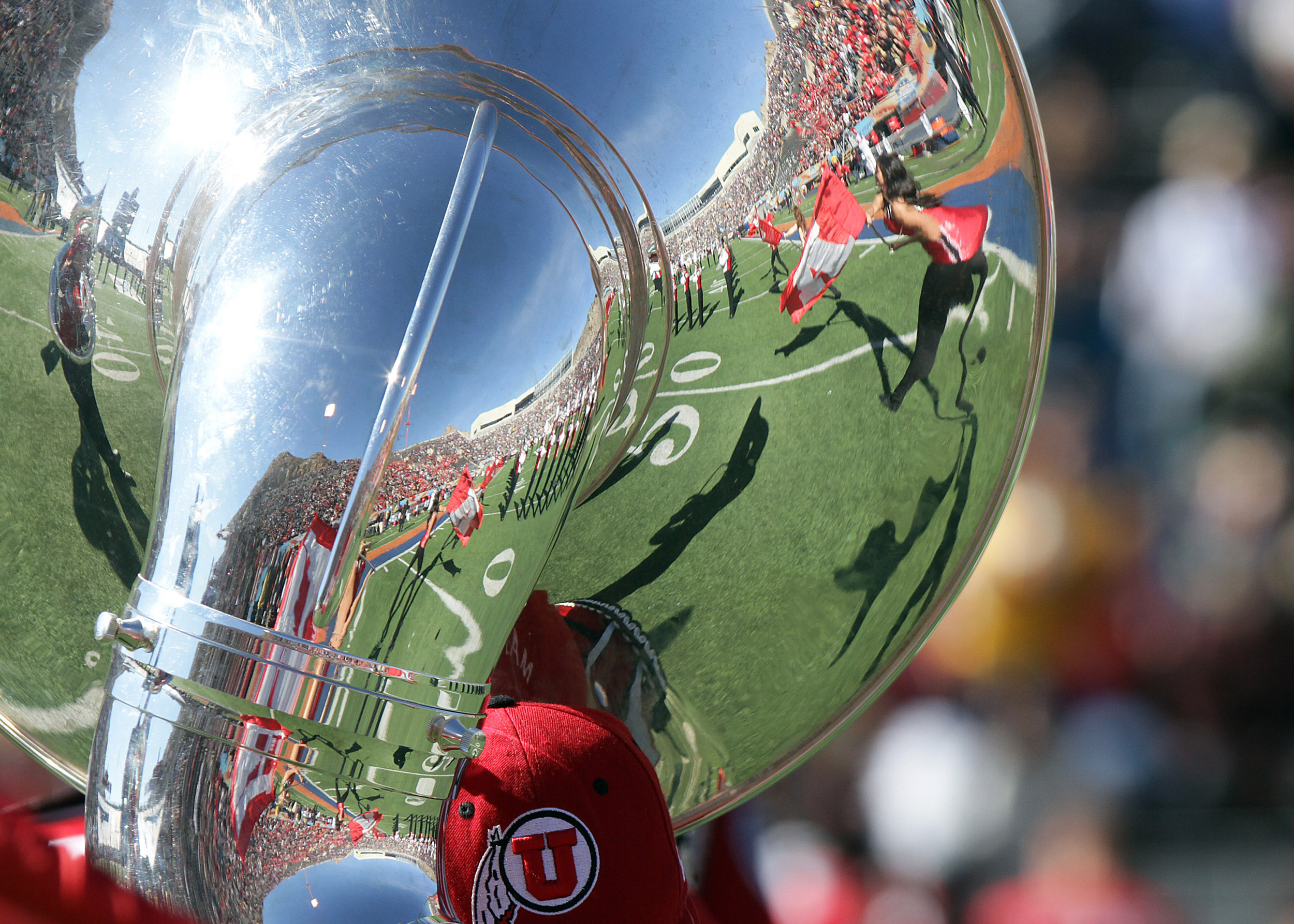 The Utah marching is reflected in an instrument during the Sun Bowl NCAA college football game against Georgia Tech on Saturday, Dec. 31, 2011, in El Paso, Texas. Utah won 30-27 in overtime. (AP Photo/El Paso Times, Mark Lambie) EL DIARIO OUT; JUAREZ MEXICO OUT; IF USE ON LAM OR LAT AND EL DIARIO DE EL PASO OUT