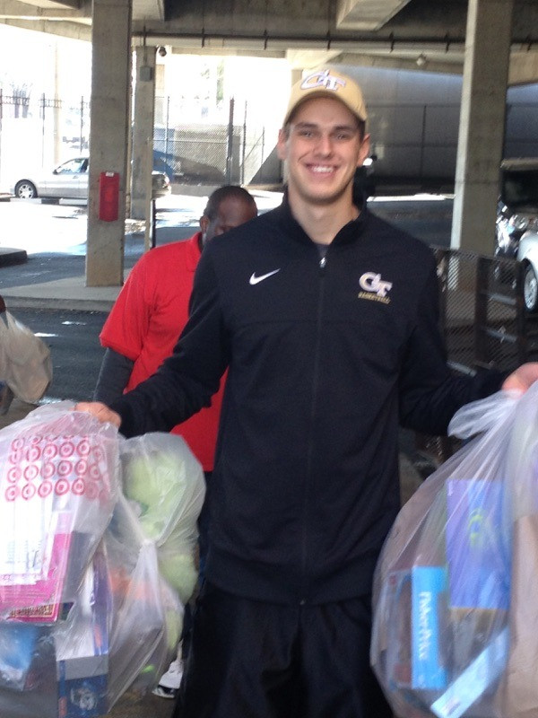Rand Rowland - Georgia Tech men's basketball delivering toys to the Atlanta Childrens Shelter as part of the annual Michael Isenhour Toy Drive