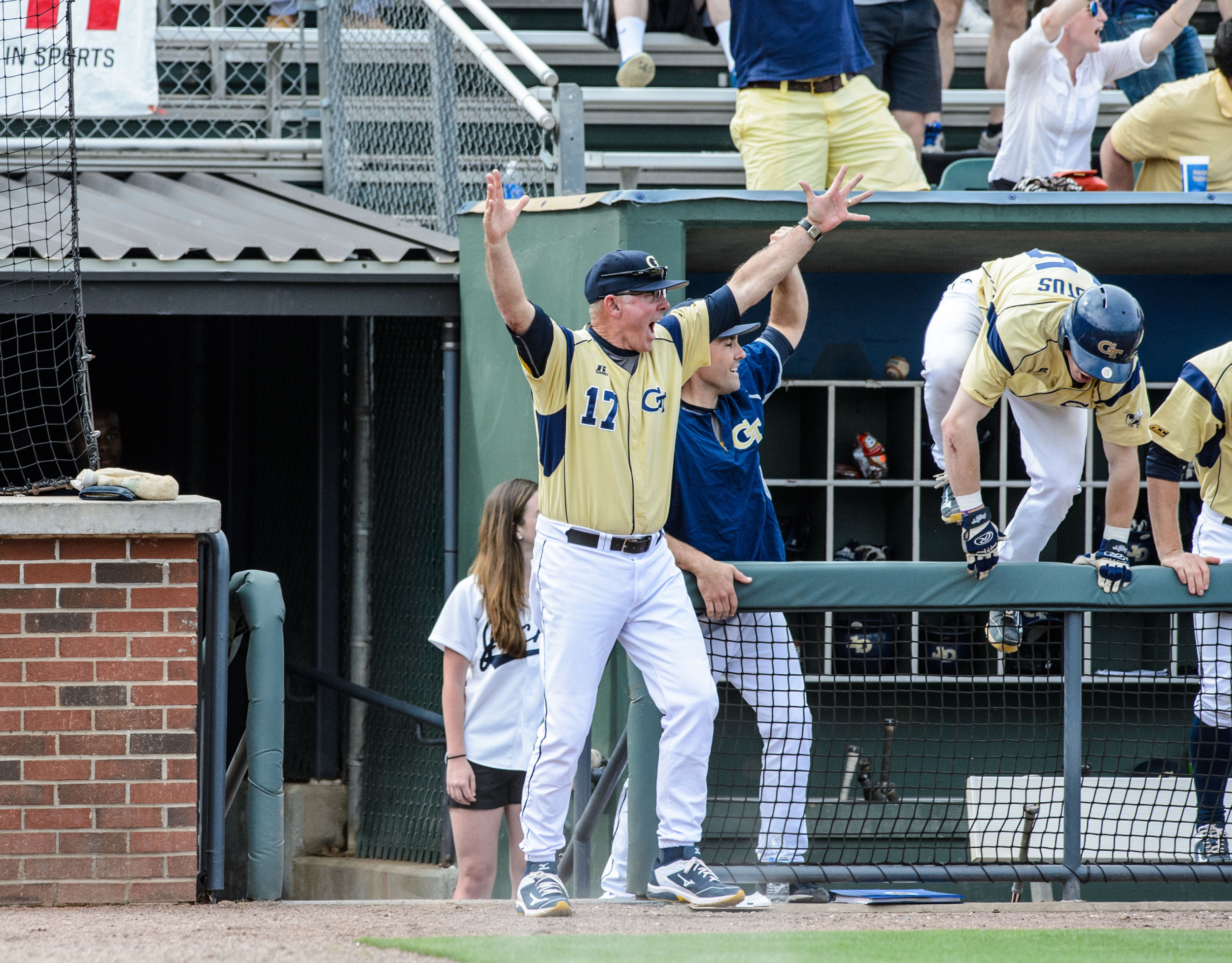 Coach Danny Hall (17) reacts to Thomas Smith's walk-off