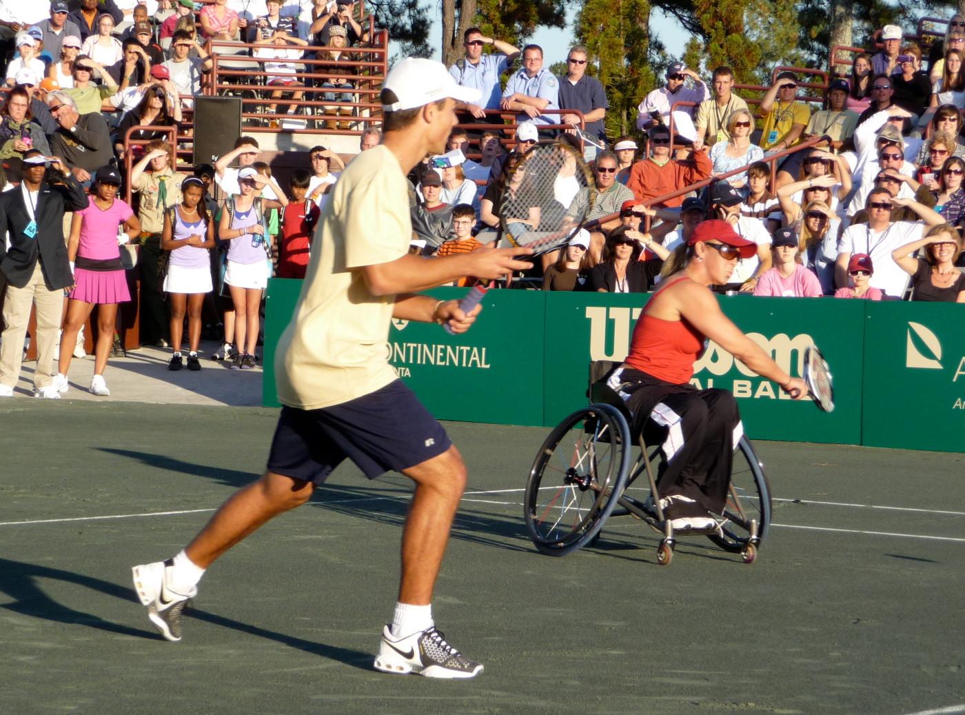 Ryan Smith plays a match with one of the wheelchair athletes.