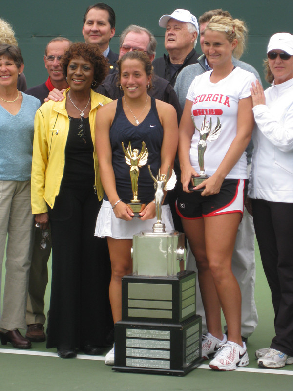 Irina Falconi holds her championship trophy next to runner-up Chelsey Gullickson of Georgia
