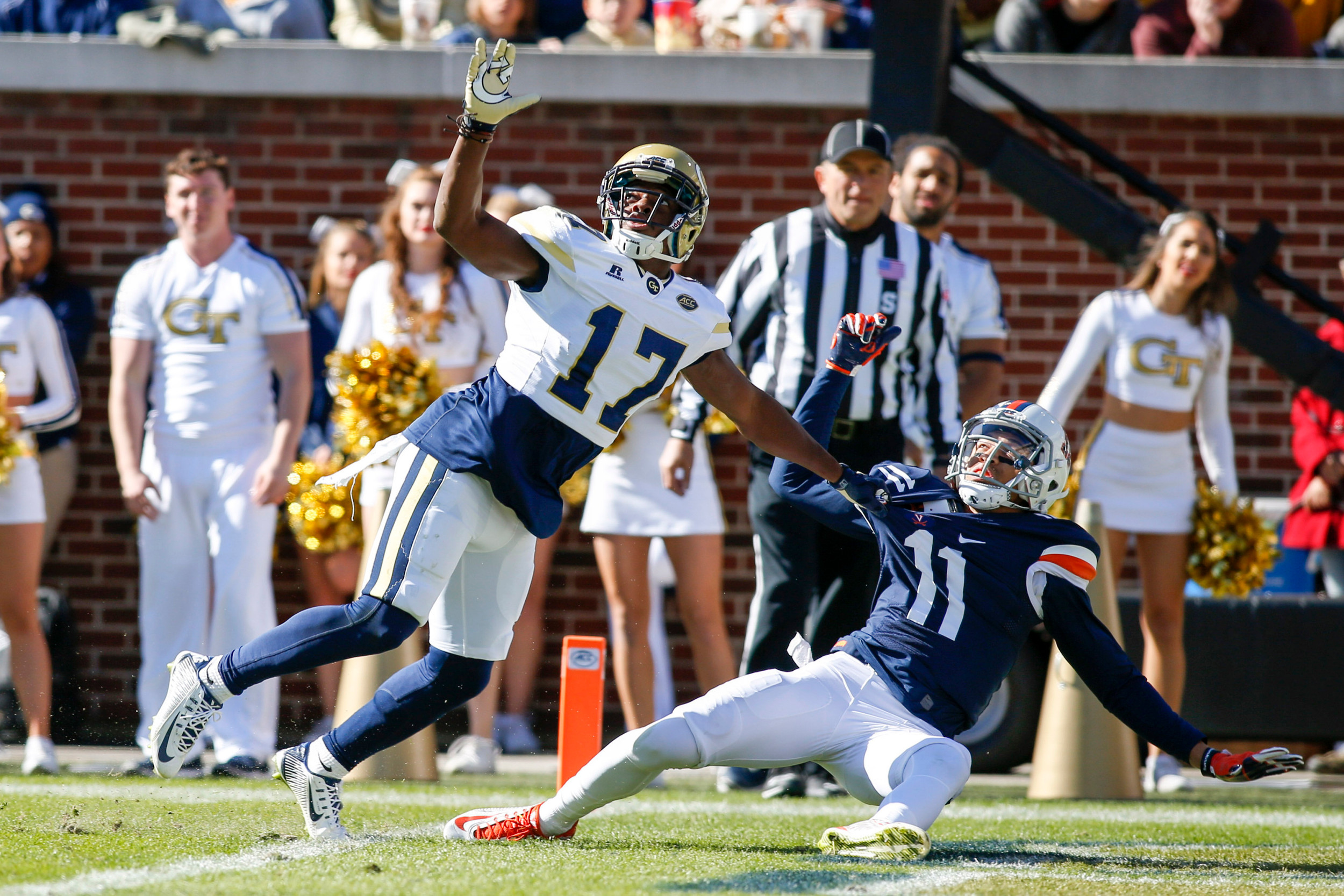Yellow Jackets defensive back Lance Austin (17) defends Cavaliers wide receiver David Eldridge (11) in the first quarter. Brett Davis-USA TODAY Sports