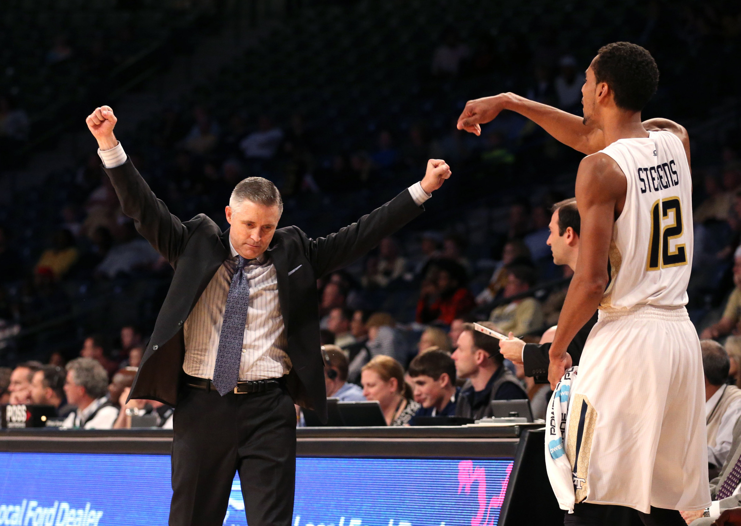 Dec 1, 2015; Atlanta, GA, USA; Georgia Tech Yellow Jackets head coach Brian Gregory reacts to a play with forward Quinton Stephens (12) in the second half of their game against the Wofford Terriers at McCamish Pavilion. The Yellow Jackets won 77-61. Mandatory Credit: Jason Getz-USA TODAY Sports