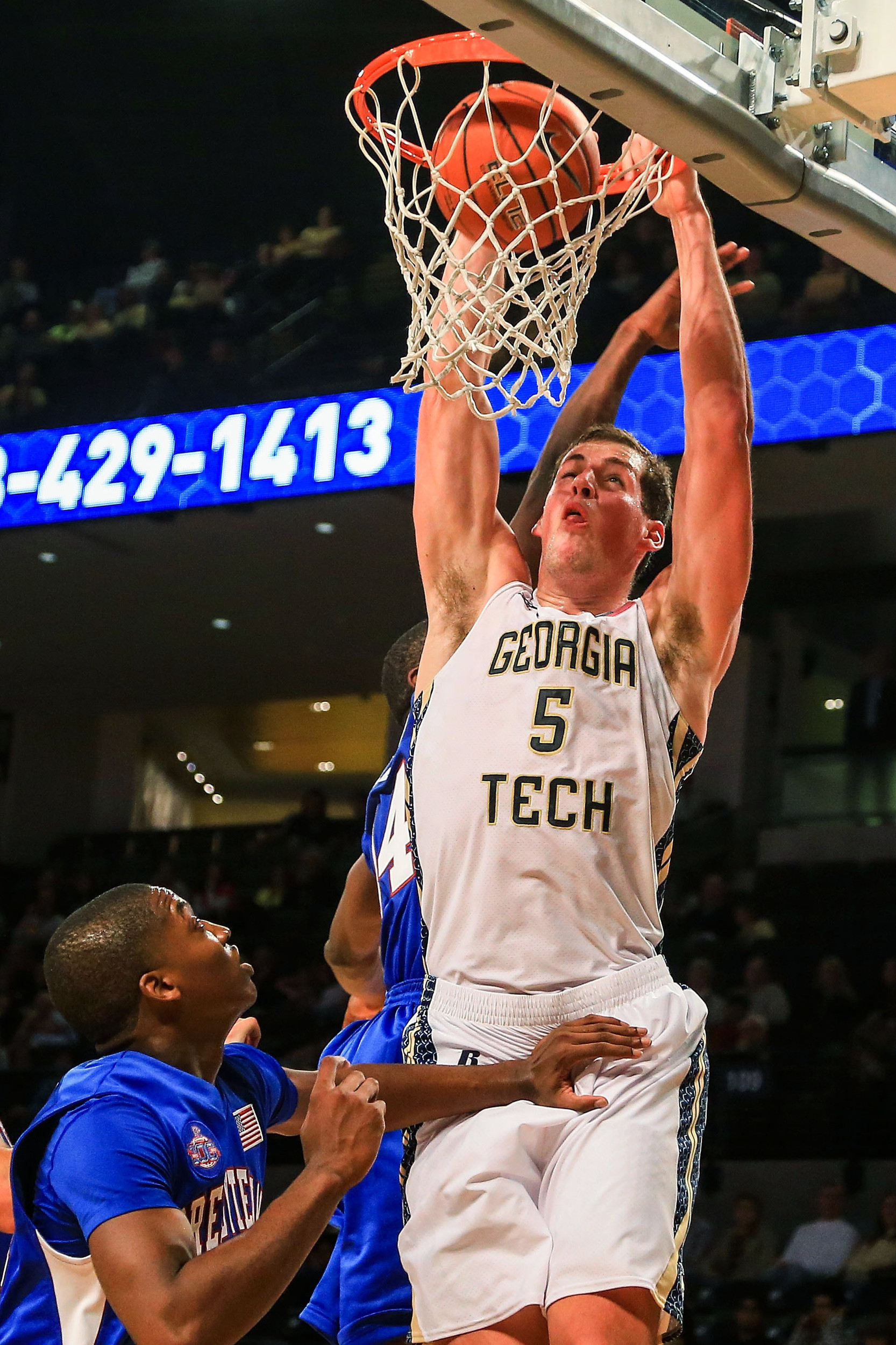 Nov 8, 2013; Atlanta, GA, USA; Georgia Tech Yellow Jackets center Daniel Miller (5) dunks in the first half against the Presbyterian Blue Hose at Hank McCamish Pavilion. Mandatory Credit: Daniel Shirey-USA TODAY Sports