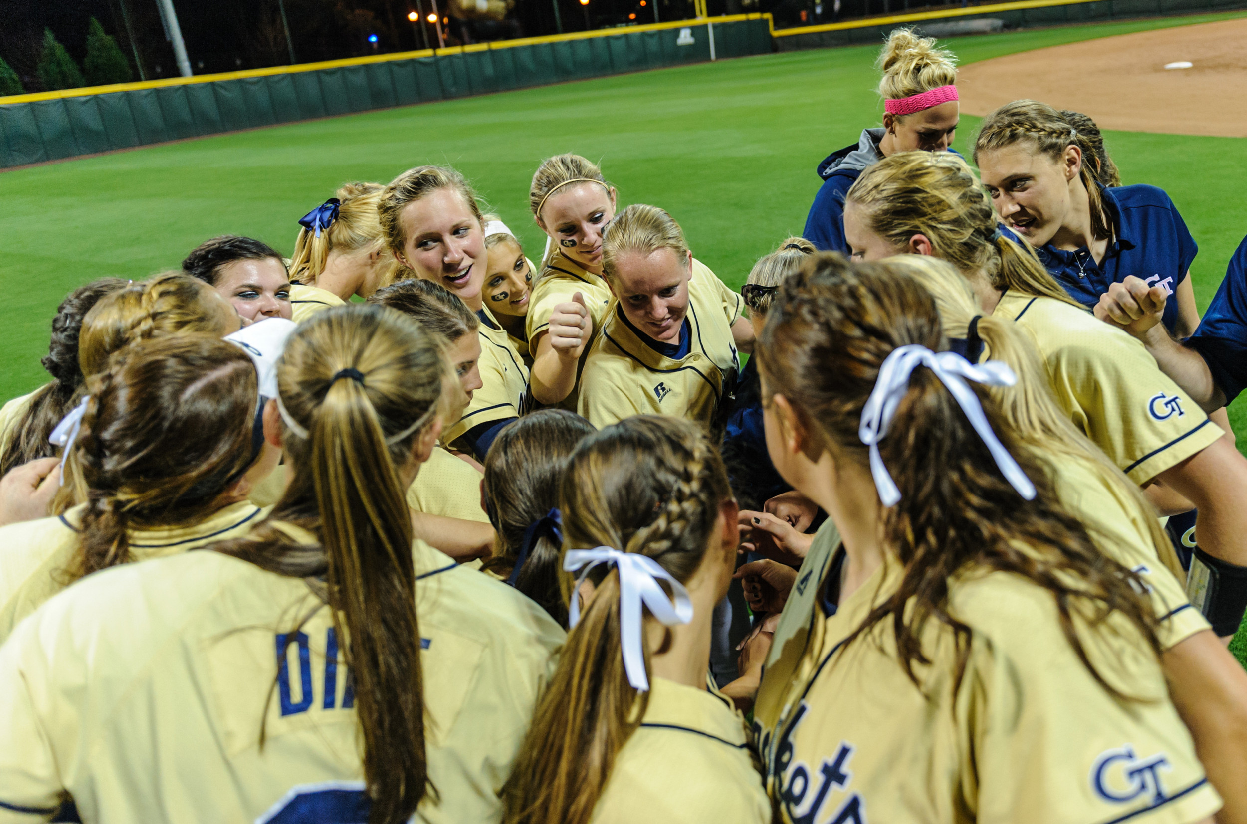 The team huddles after the victory.