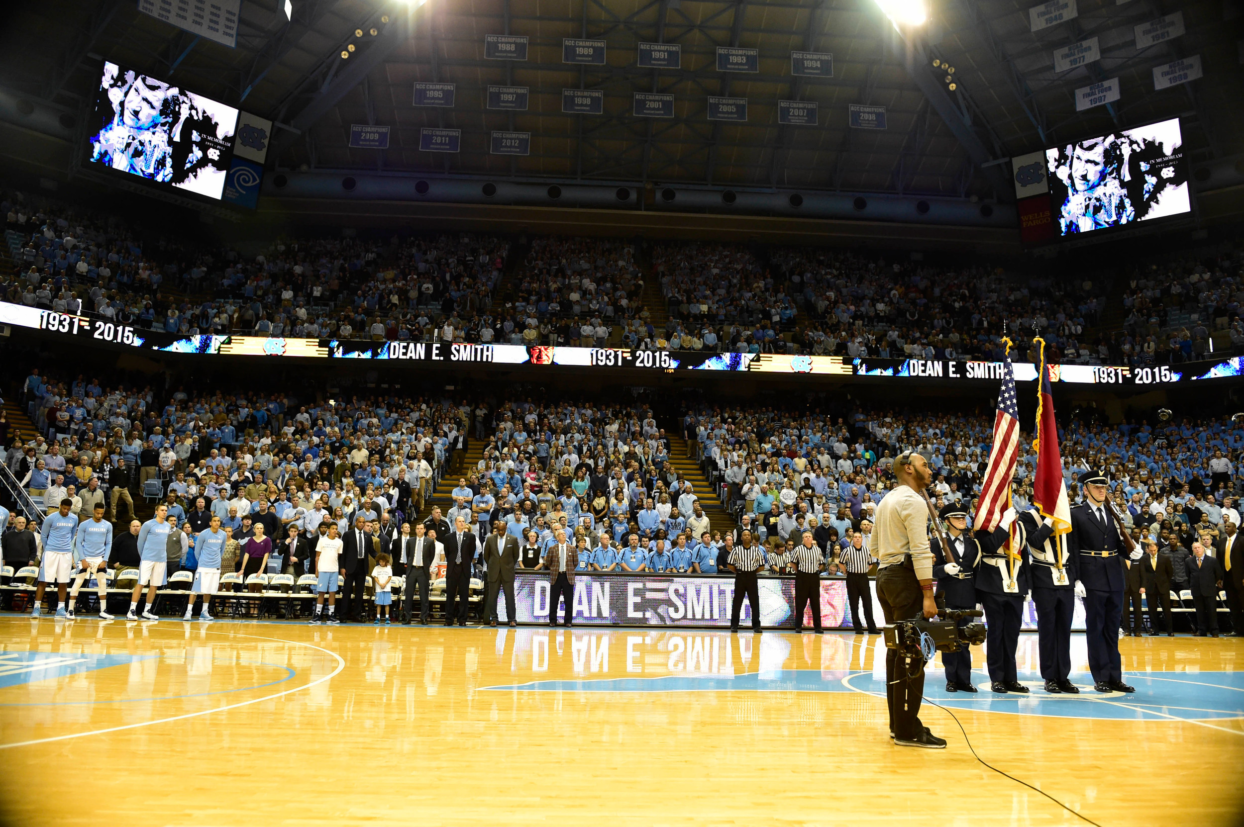 A moment of silence is held for former coach Dean E. Smith before the game at Dean E. Smith Center. Credit: USA Today