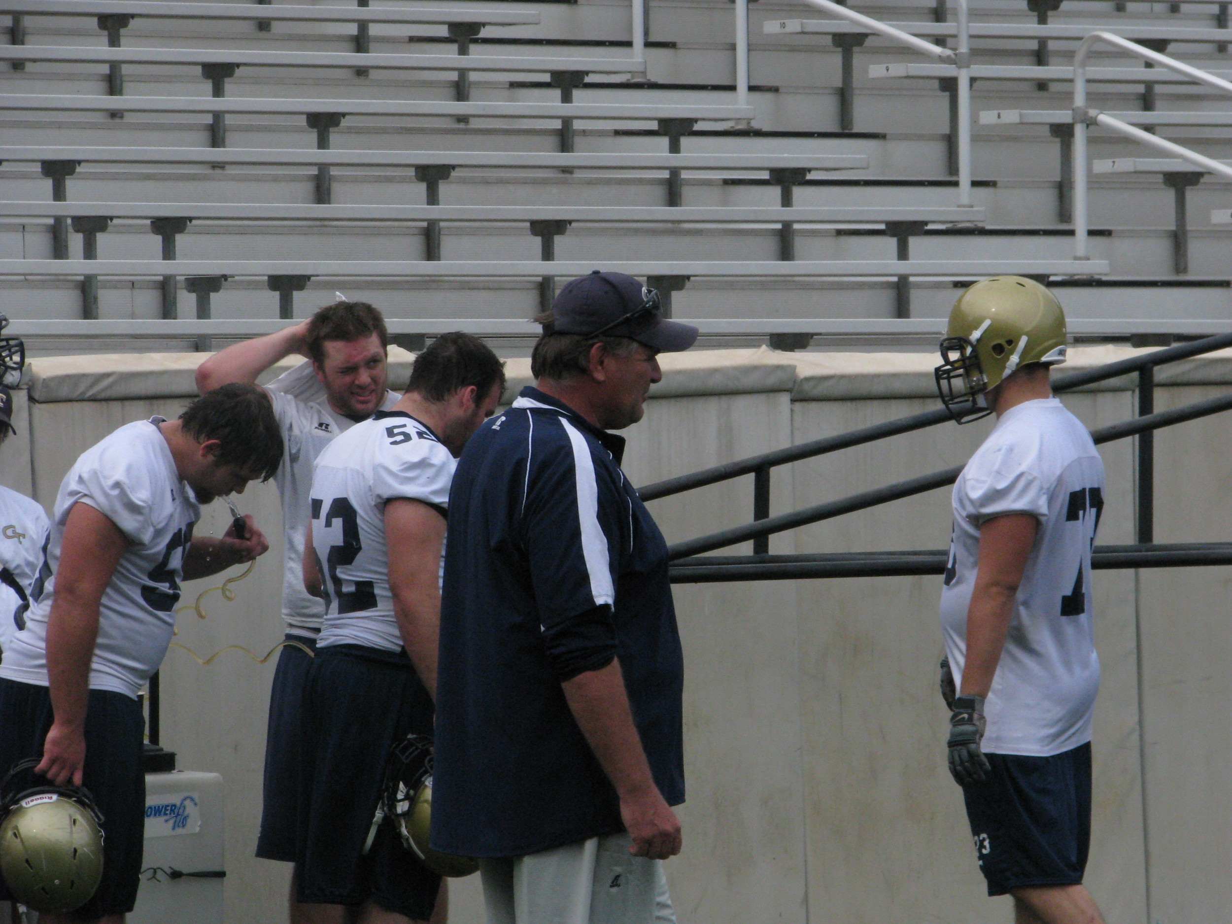 Coach Sewak talking to member of offensive line - Georgia Tech Football Practice - 04/20/11