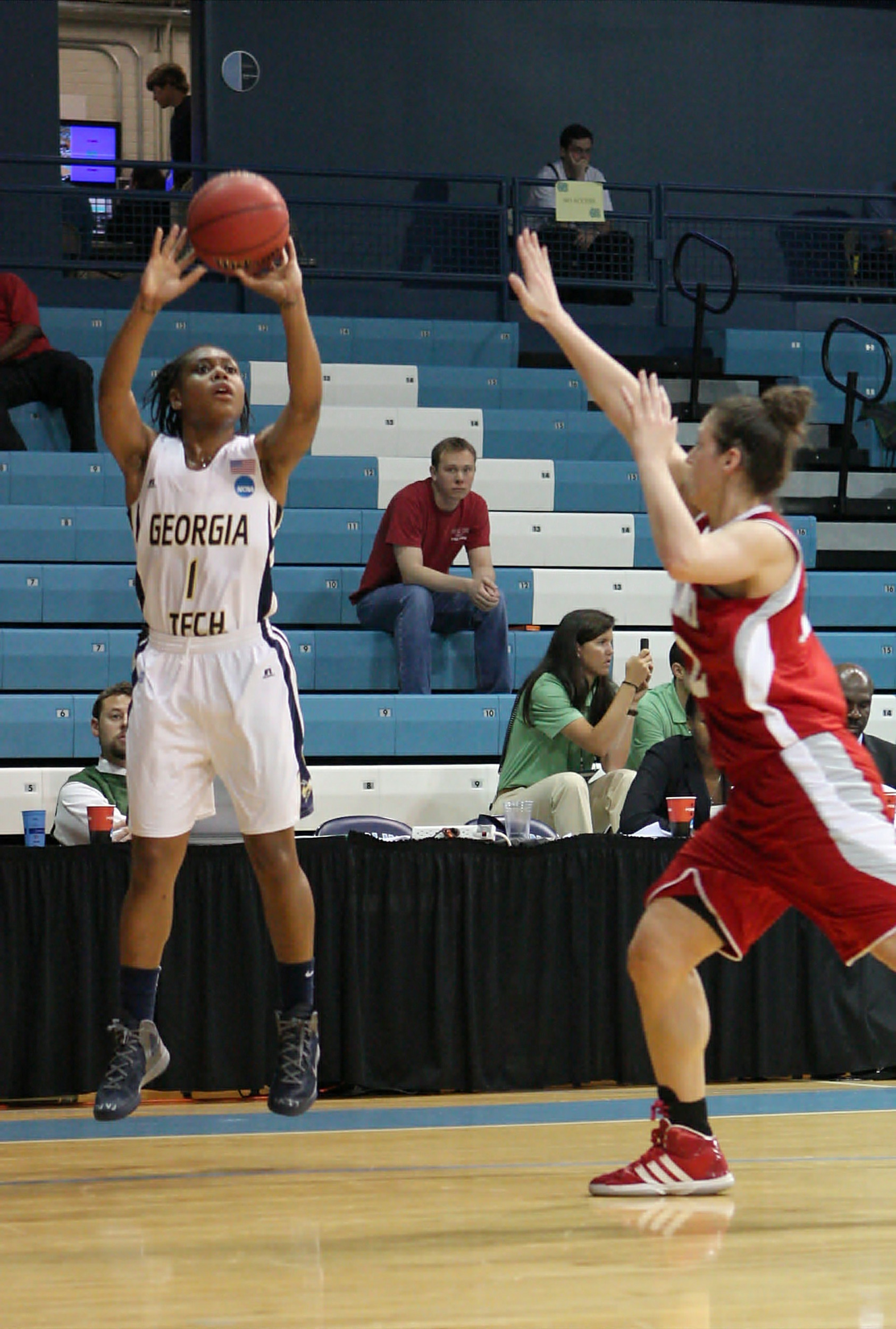 Dawnn Maye shoots a three against Sacred Heart in NCAA Tournament First Round.