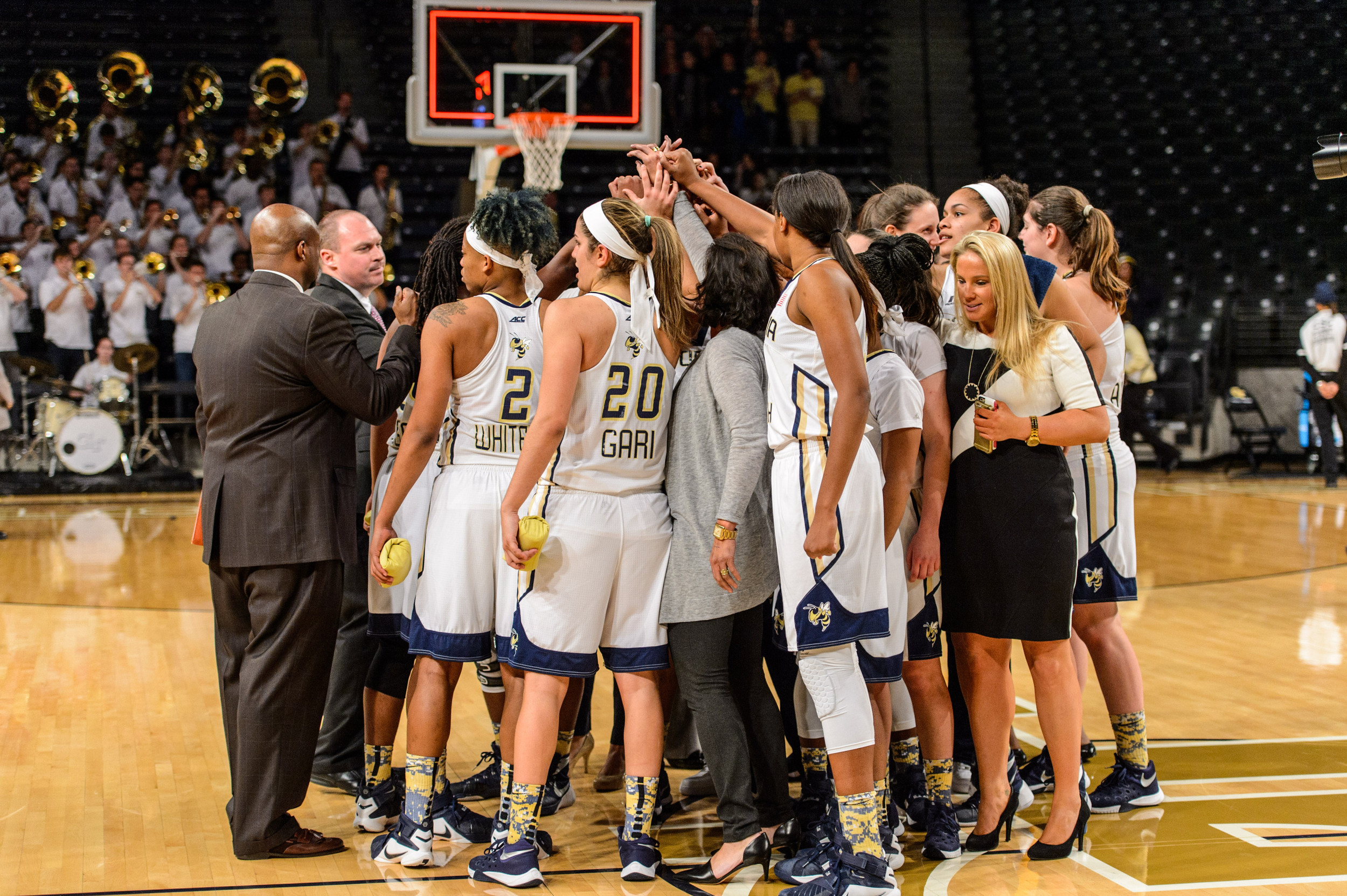 Coach Jo talks to the team after the win
