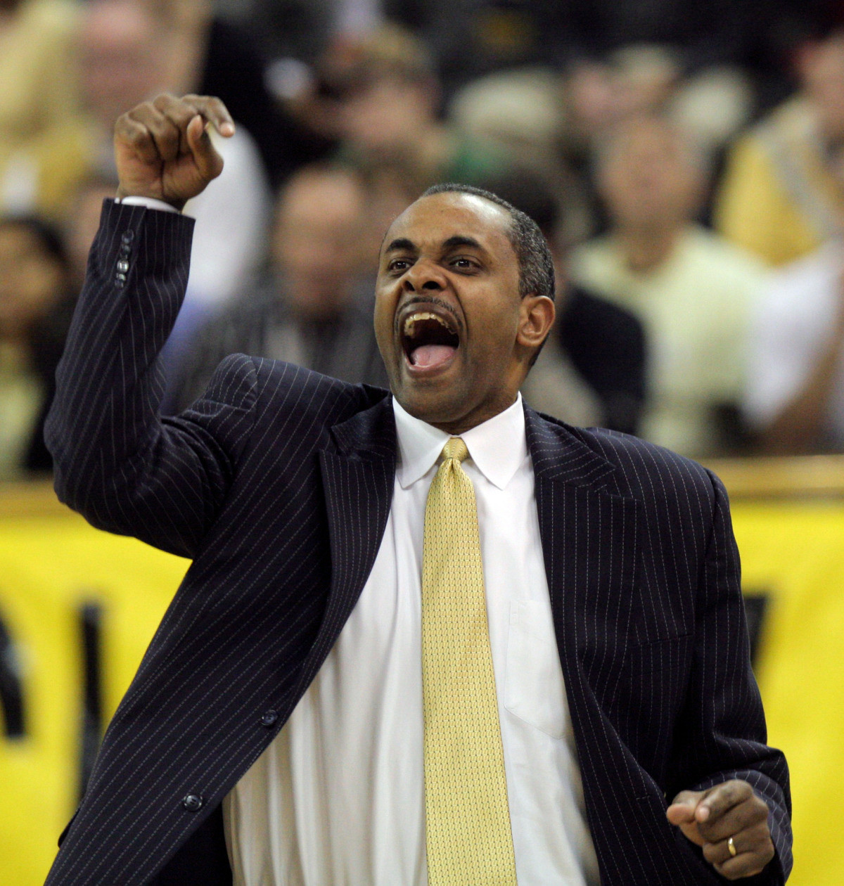 Paul Hewitt yells to his team in the first half. (AP Photo/John Bazemore)