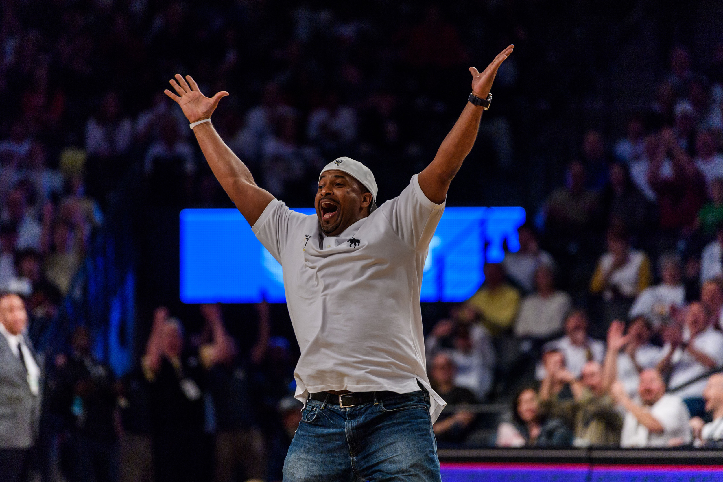 Brian Oliver hits a halfcourt shot to win free pizza for a year for a GT student