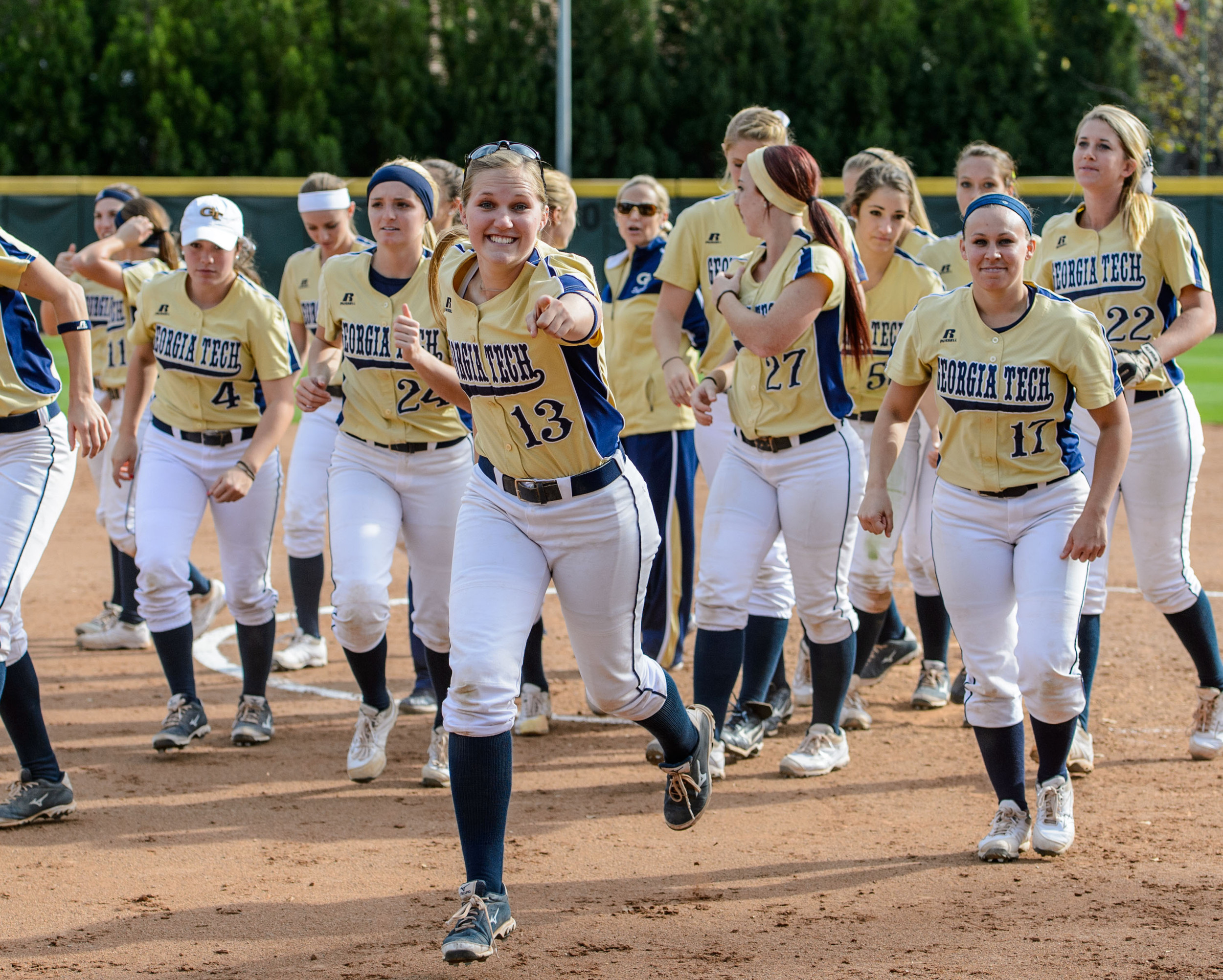 Jessica Kowalewicz (13) and the GT Softball team run off the field
