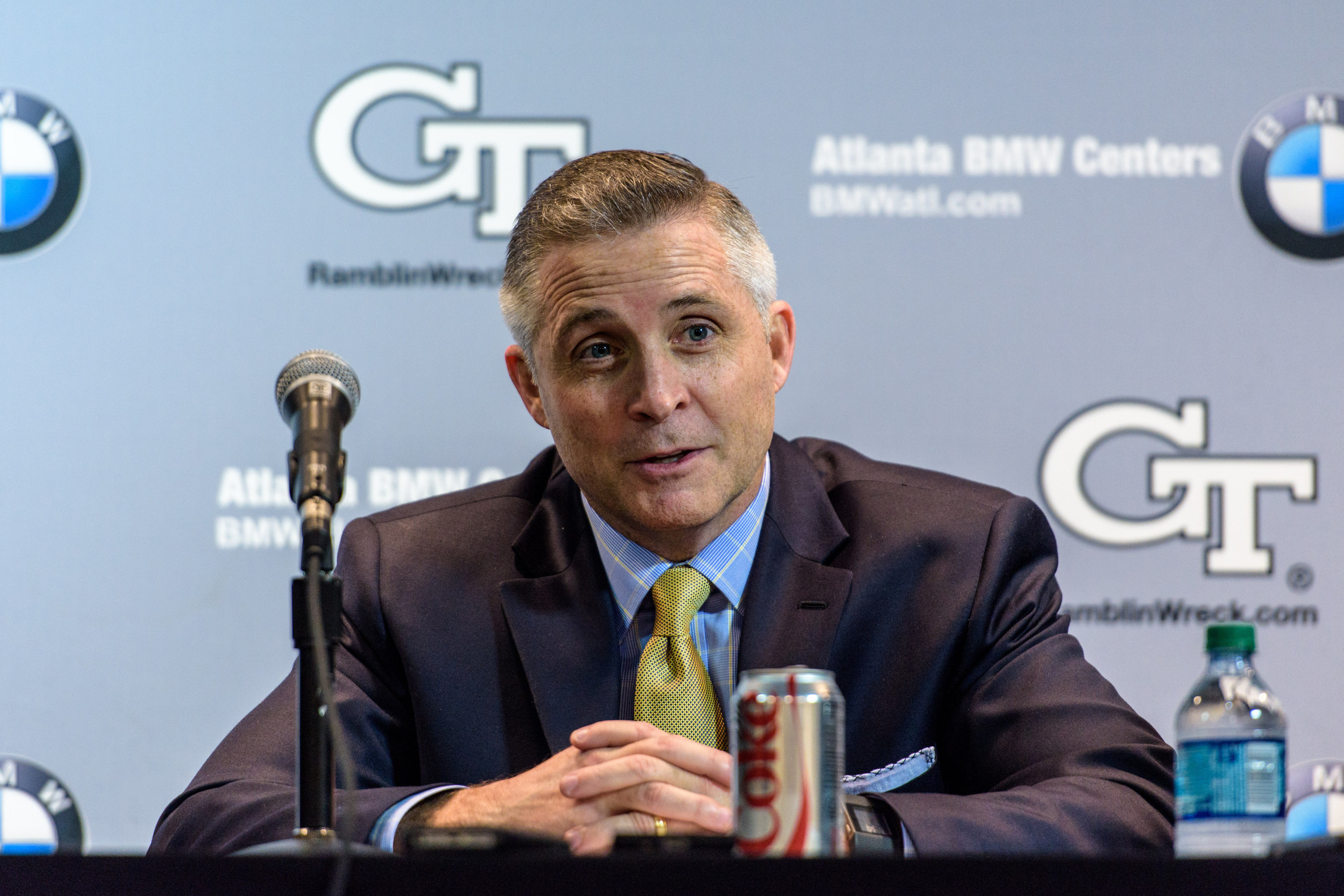 Coach Brian Gregory talks to the media in the postgame press conference