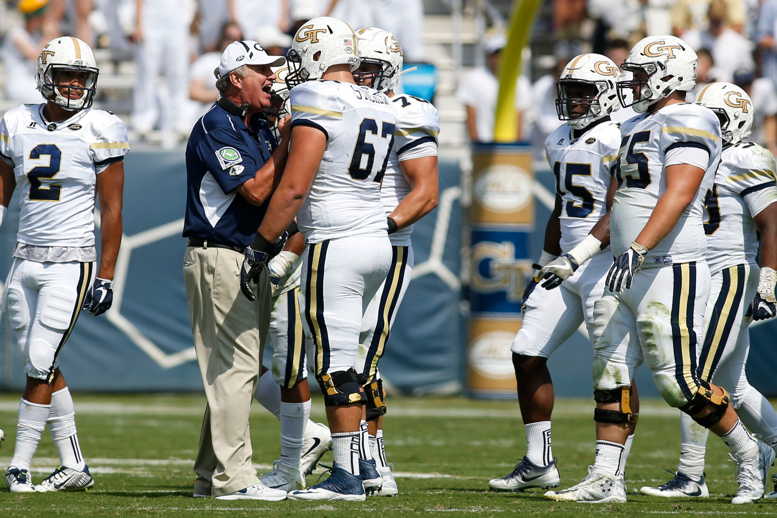 Sep 30, 2017; Atlanta, GA, USA; Georgia Tech Yellow Jackets head coach Paul Johnson talks to offensive lineman Jake Stickler (67) against the North Carolina Tar Heels in the second quarter at Bobby Dodd Stadium. Mandatory Credit: Brett Davis-USA TODAY Sports