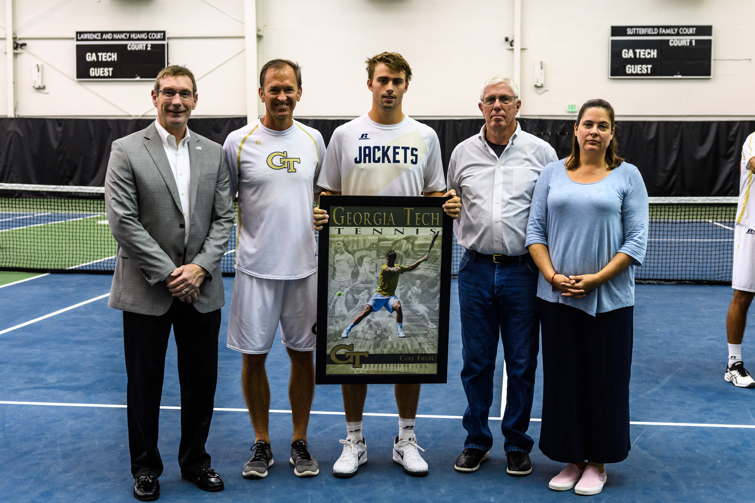 Cole Fiegel, his parents, Coach Kenny Thorne, and Director of Athletics Todd Stansbury
