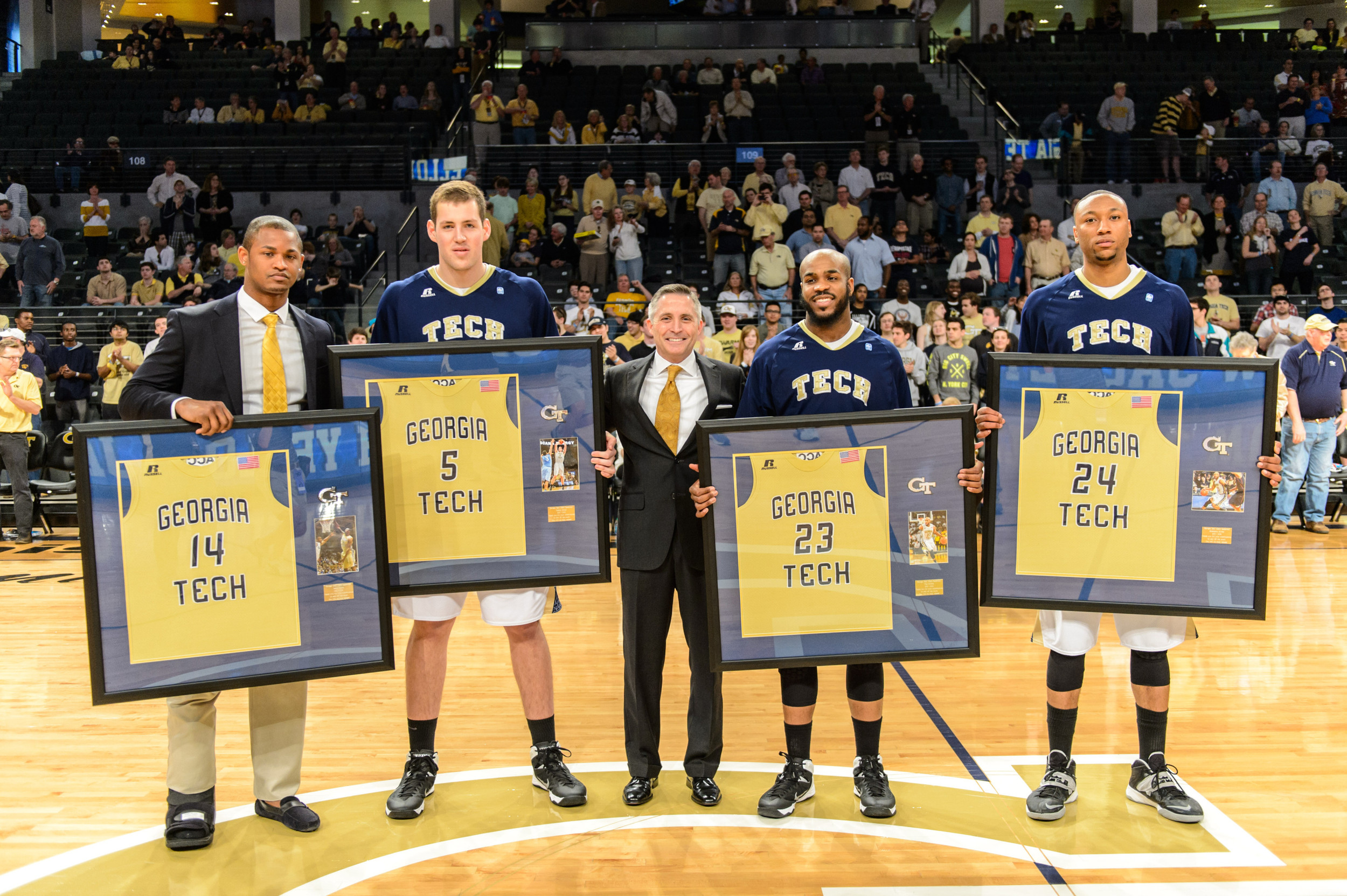 Trae Golden (23), Brian Gregory, Kammeon Holsey (24), Daniel Miller (5), Jason Morris (14)