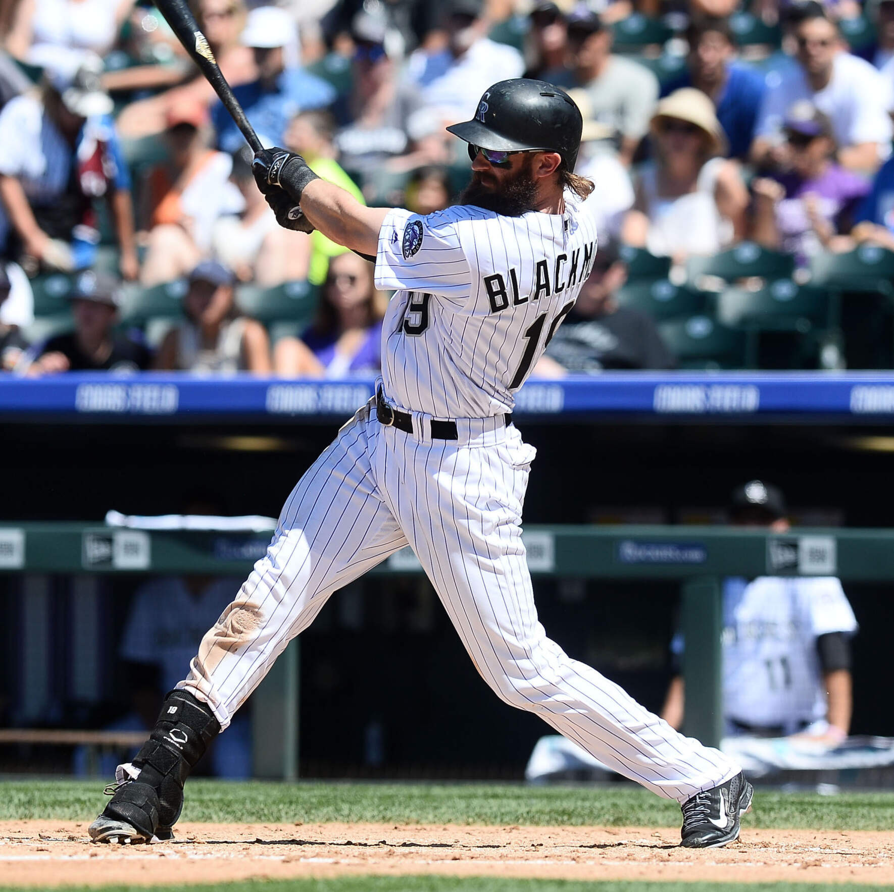 Colorado Rockies center fielder Charlie Blackmon (19) hits a solo home run. Credit: Ron Chenoy-USA TODAY Sports