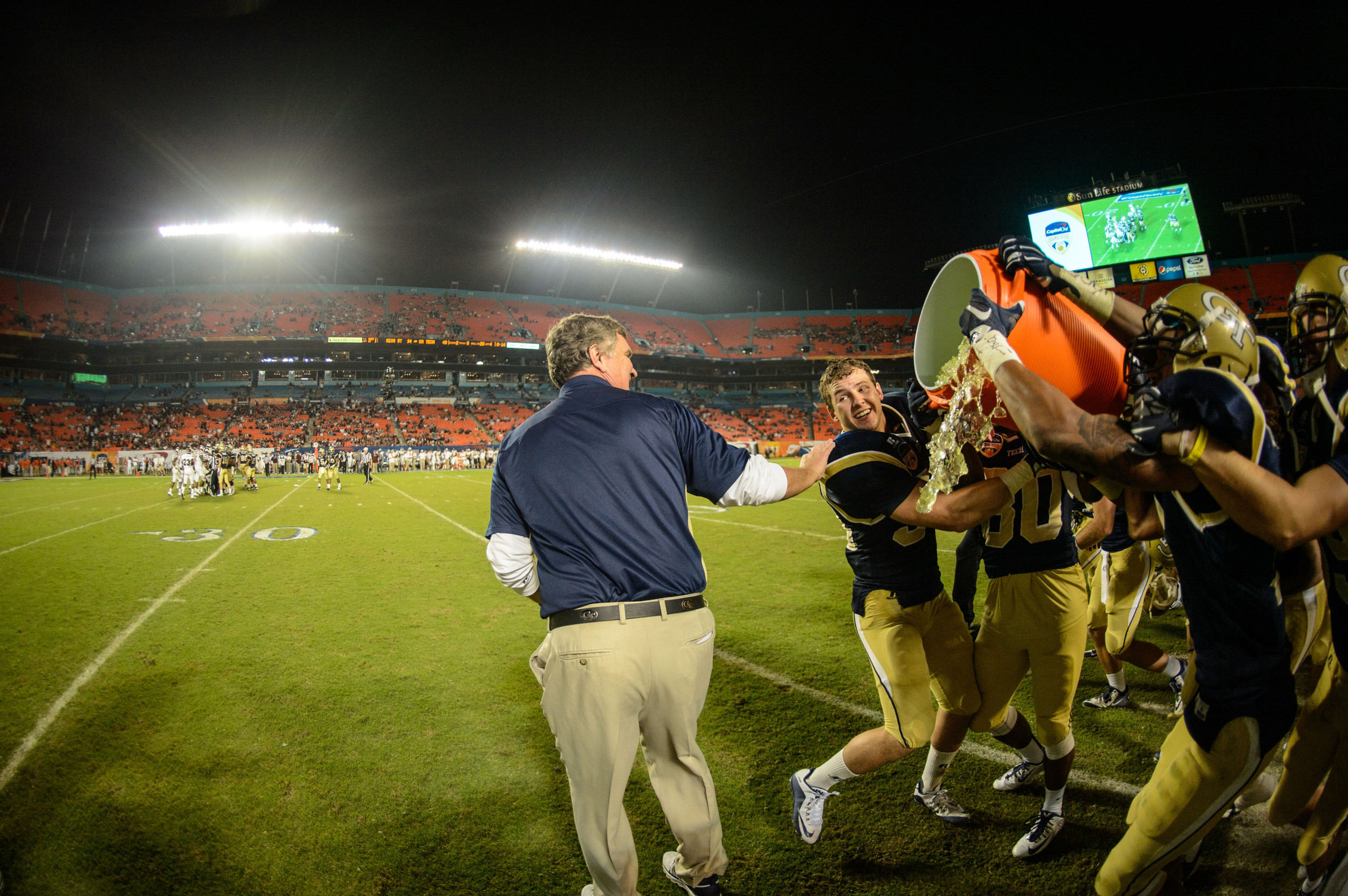 Coach Paul Johnson gets hit with the Gatorade bath