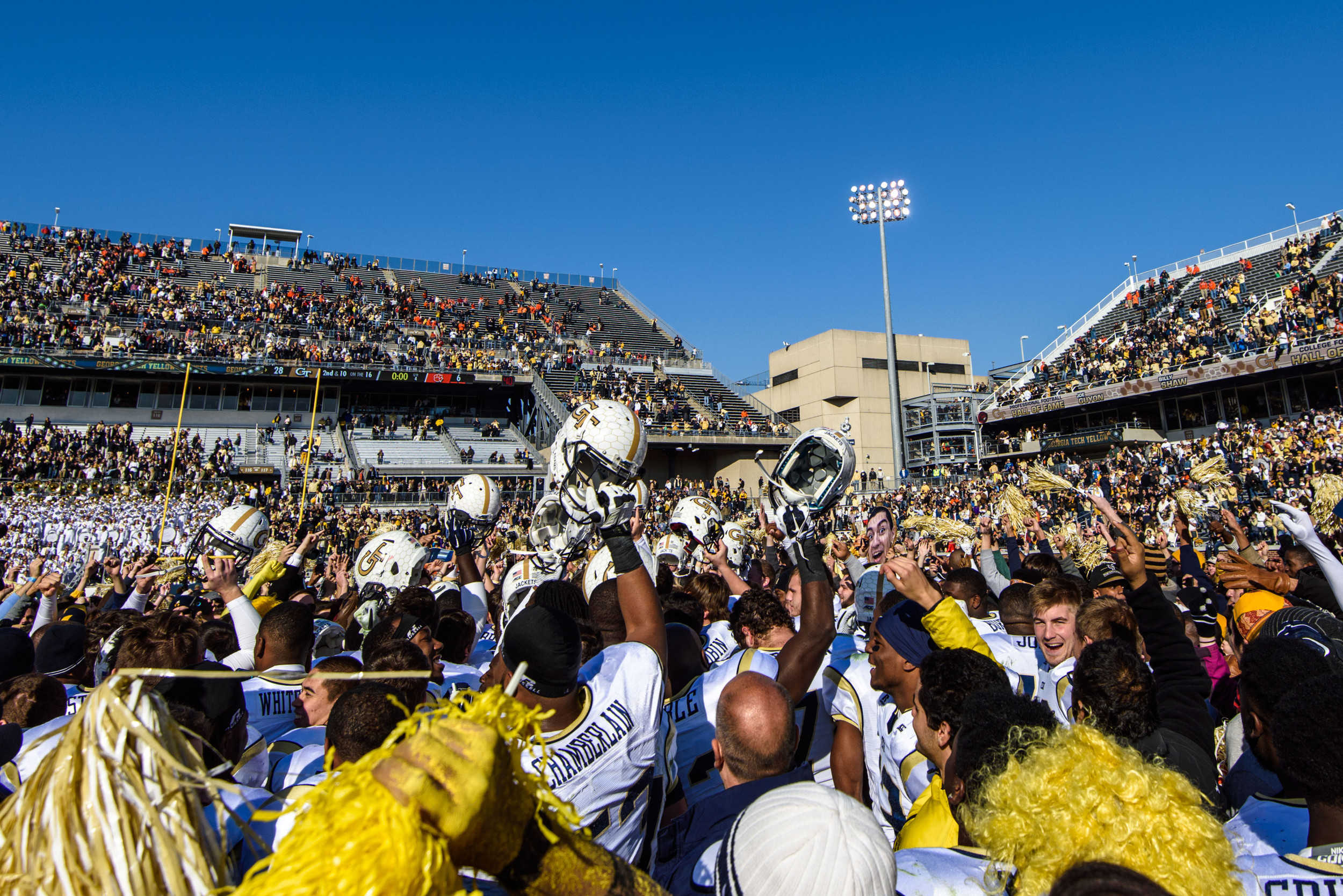 Fans celebrate with the team after the win