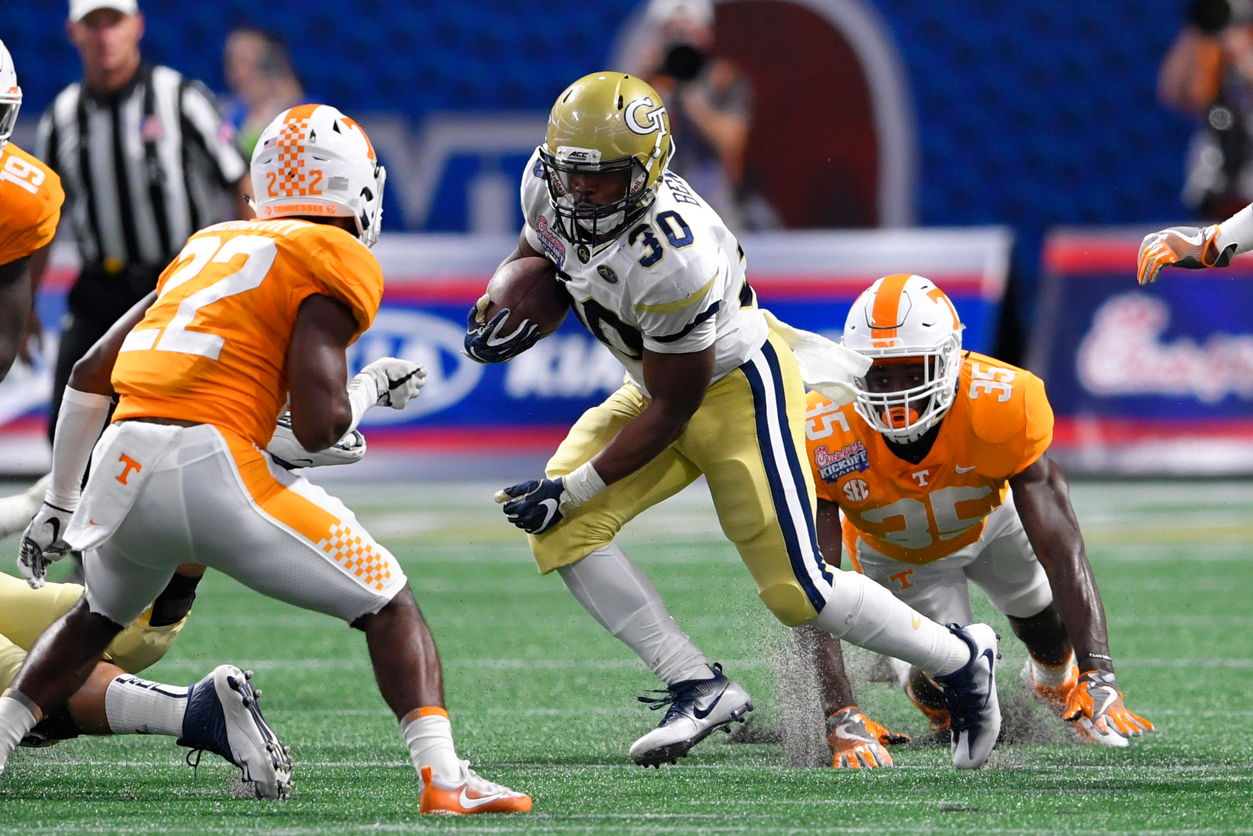 Sep 4, 2017; Atlanta, GA, USA; Georgia Tech Yellow Jackets running back KirVonte Benson (30) runs the ball against the Tennessee Volunteers during the first quarter at Mercedes-Benz Stadium. Mandatory Credit: Dale Zanine-USA TODAY Sports
