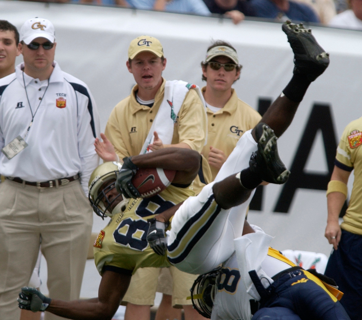 Georgia Tech wide receiver James Johnson (89) is tackled by West Virginia free safety Quinton Andrews (8) in the first quarter of the Gator Bowl college football game, Monday Jan. 1, 2007, in Jacksonville, Fla. West Virgina beat Georgia Tech, 38-35. (AP Photo/Stephen Morton)