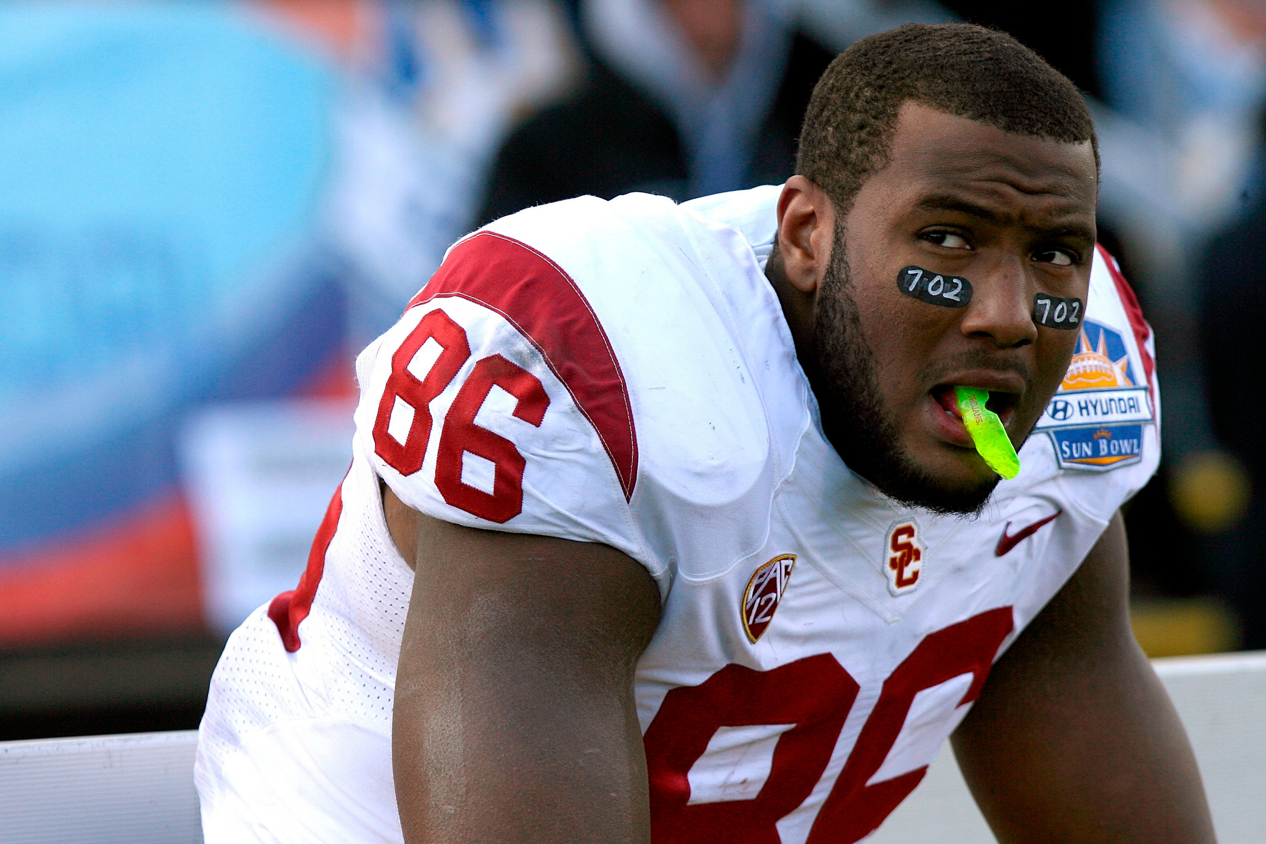 Southern California tight end Xavier Grimble sits on the bench following his team's 21-7 loss to Georgia Tech in the Sun Bowl NCAA college football game, Monday, Dec. 31, 2012, in El Paso, Texas. (AP Photo/Mark Lambie)