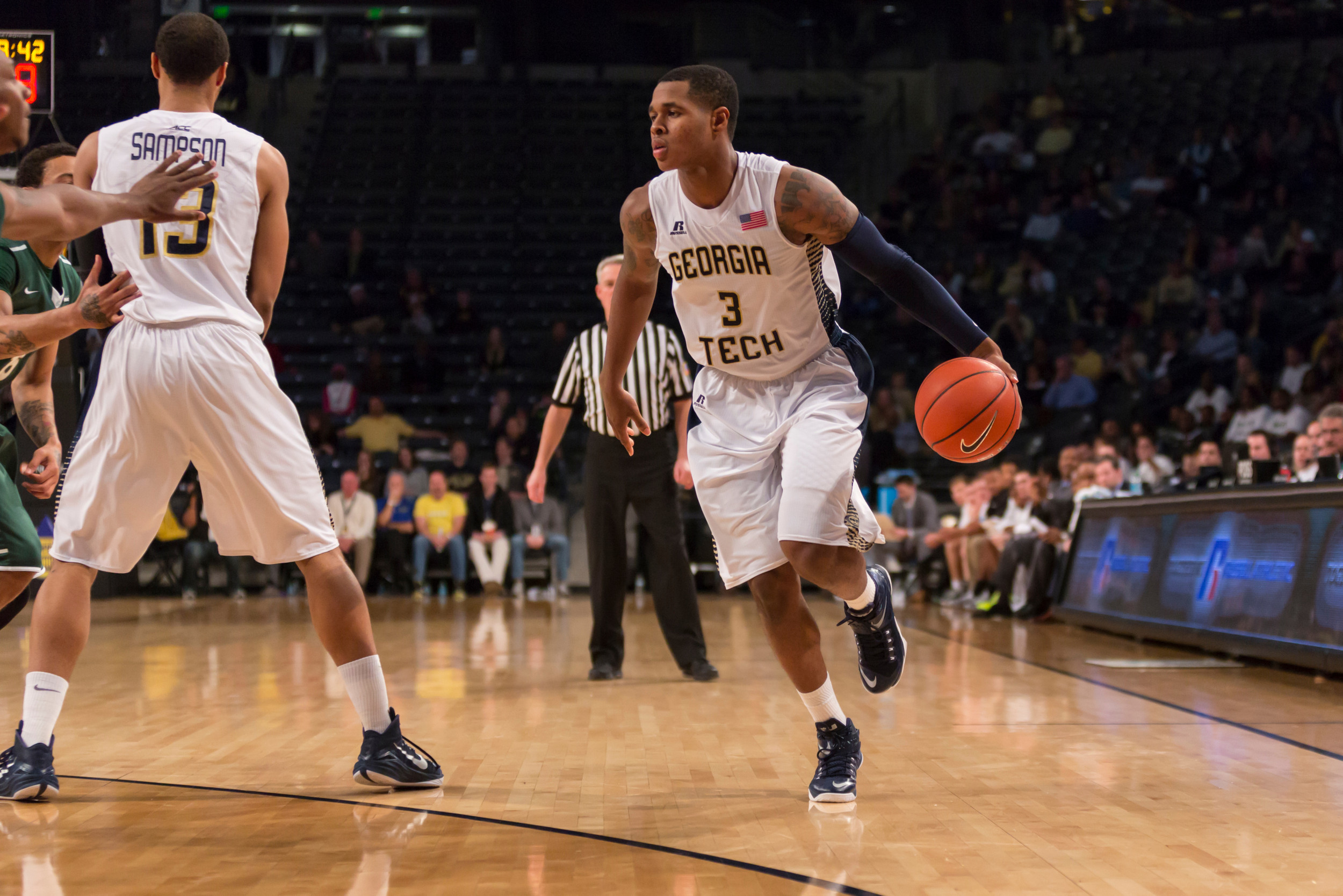 Marcus Georges-Hunt looks inside vs. Charlotte at McCamish Pavilion on December 30, 2014