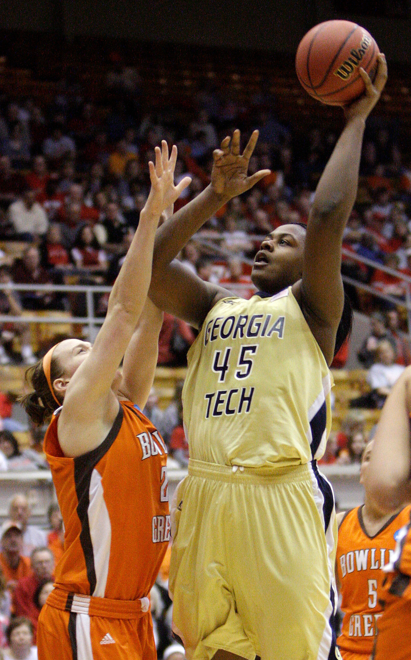 Georgia Tech's Sasha Goodlett, right, shoots over Bowling Green's Allison Papenfuss during the second half in a first round NCAA women's college basketball tournament game Saturday, March 19, 2011, in Columbus, Ohio. Georgia Tech won 69-58. (AP Photo/Jay LaPrete)