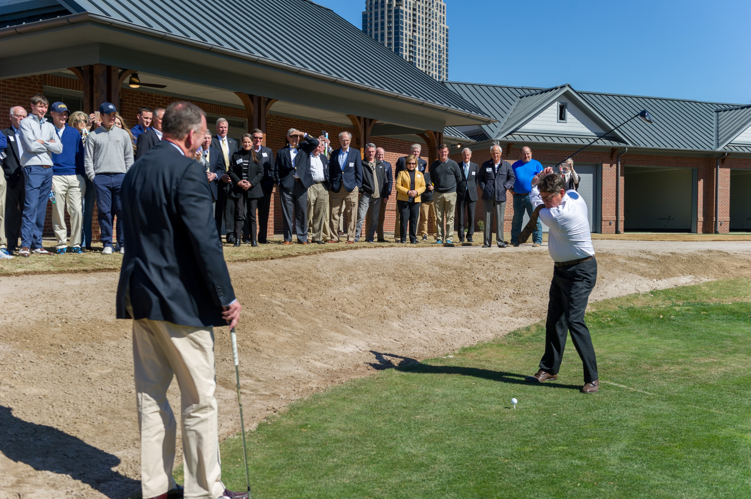 Tom Noonan hitting the cereminial first shot at the Noonan Golf Facility dedication