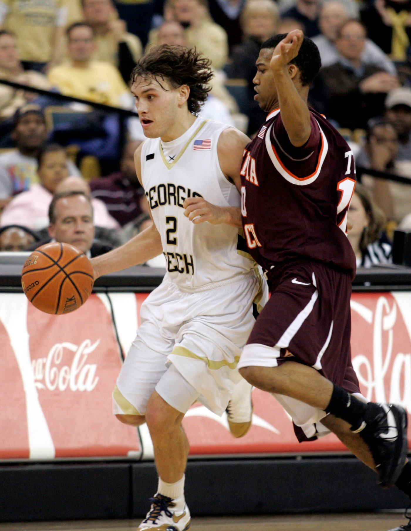 Matt Causey dribbles past Virginia Tech's Hank Thorns. (AP Photo/Tami Chappell)