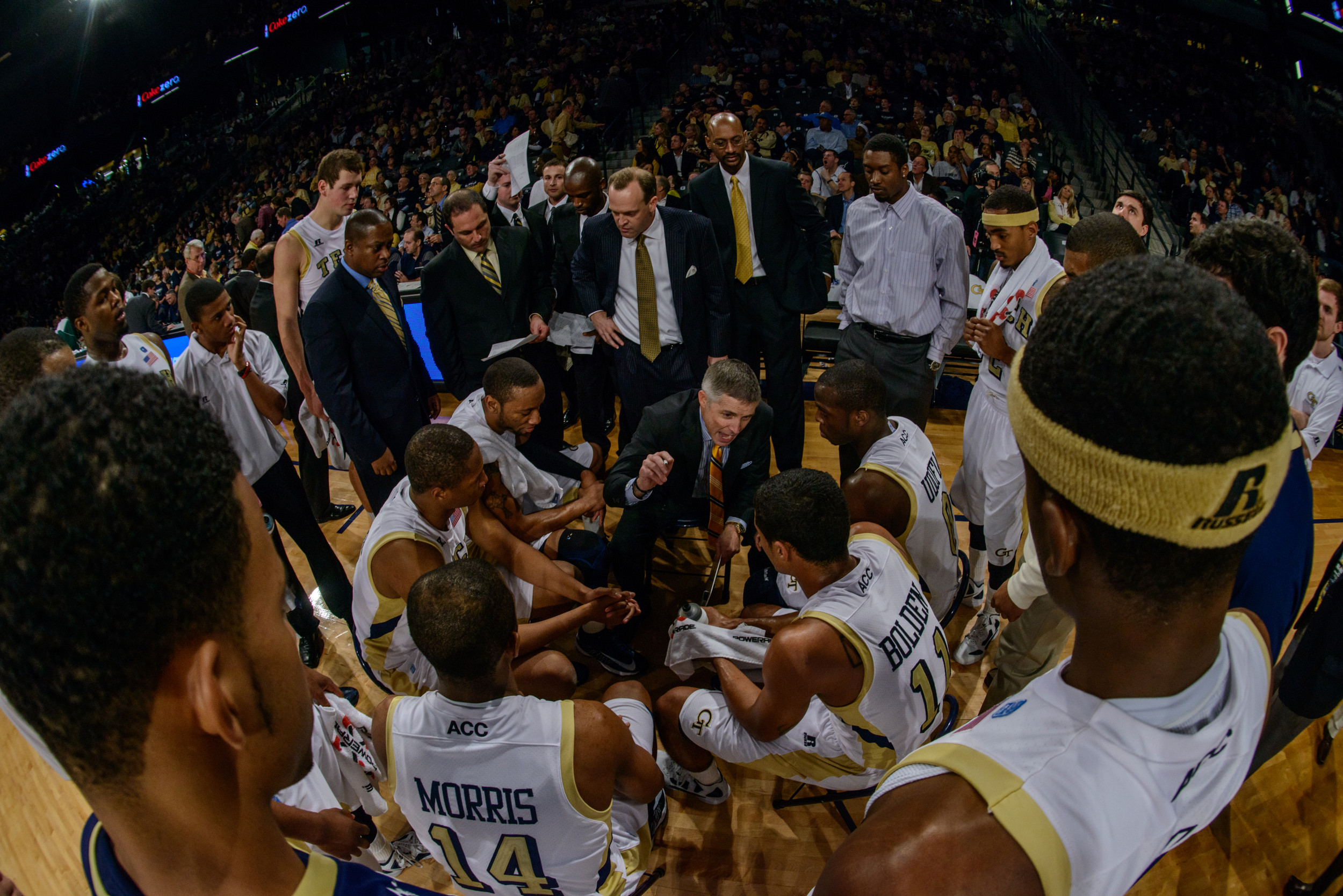 Coach Gregory speaks to the team during a timeout.