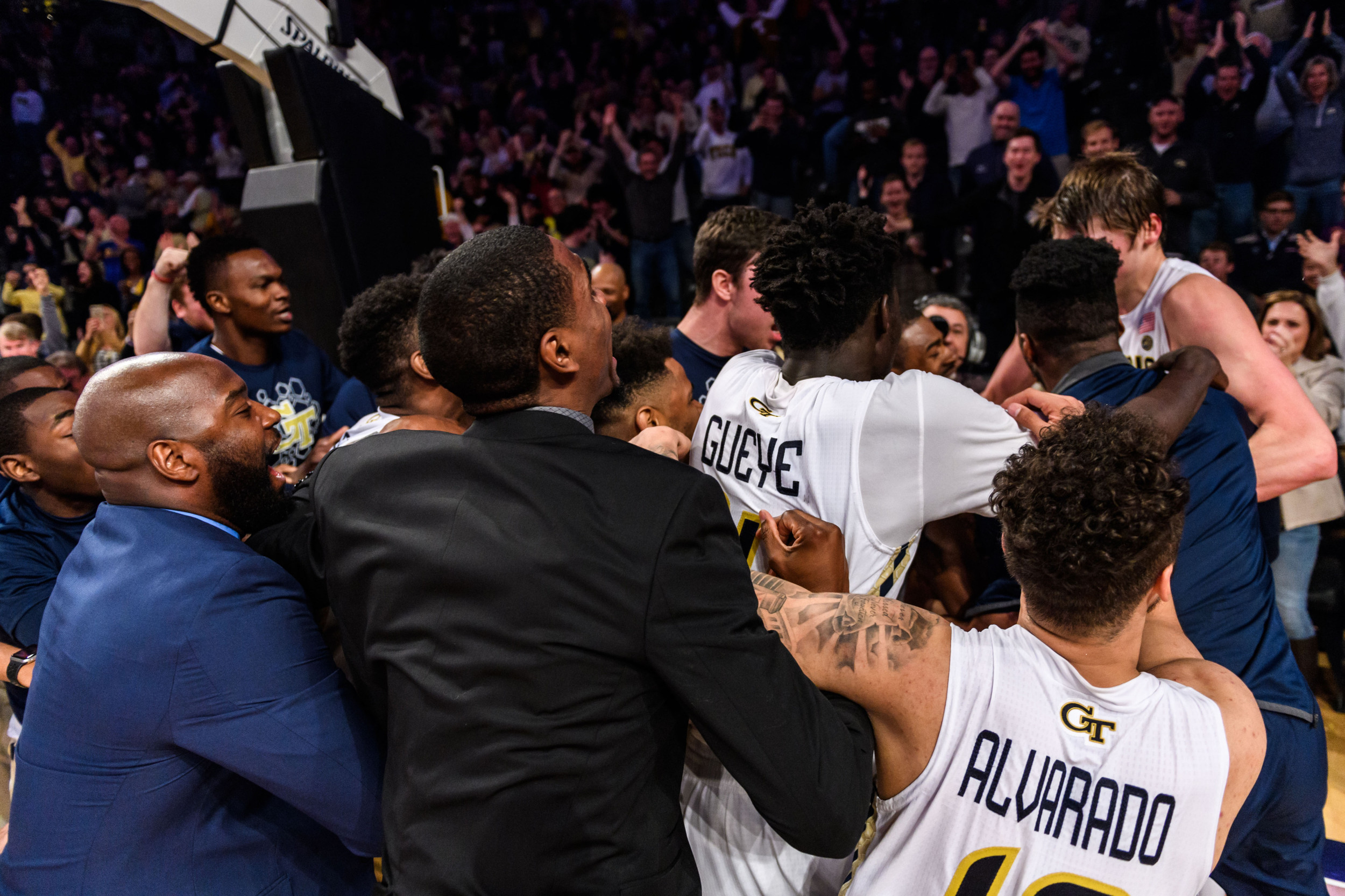 The Jackets swarm Tadric Jackson after the buzzer beater