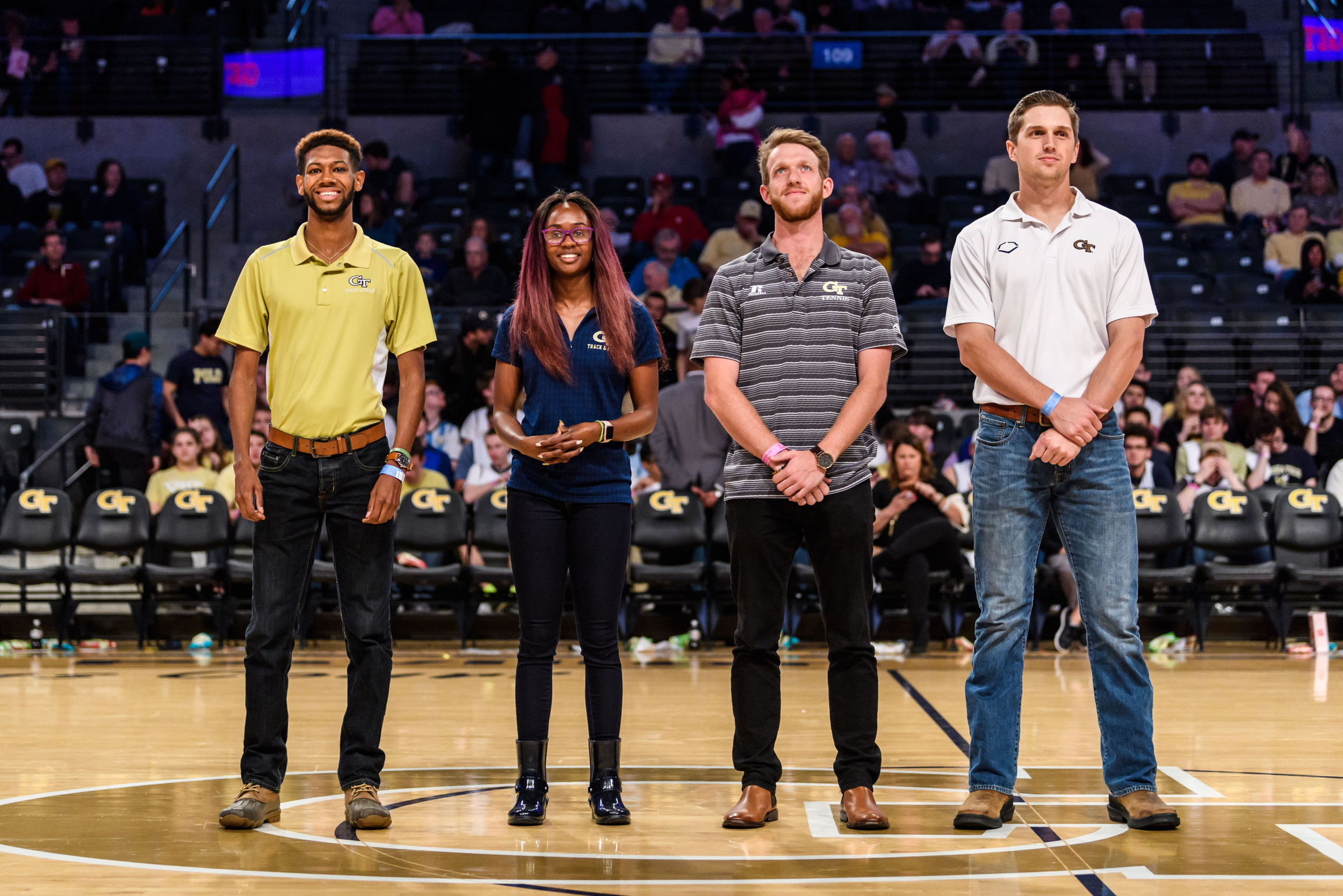Alex Grady (Cross Country/Track and Field), Angelica Henderson (Track and Field), Michael Kay (Men's Tennis), and Kel Johnson (Baseball) were recognized on the court for earning ACC Postgraduate Scholarships.