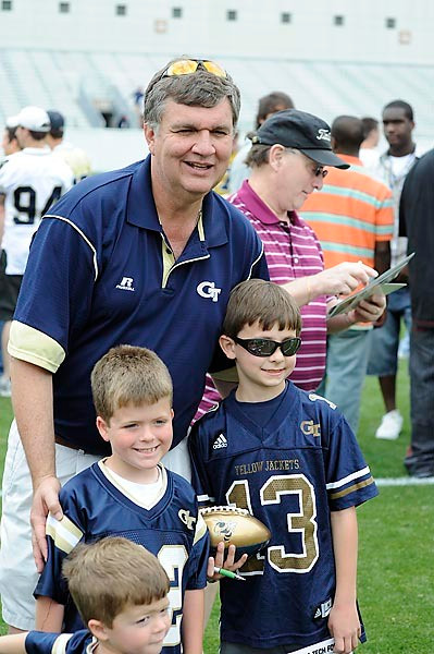 Coach Johnson with fans after the game.Photo by LensEffects
